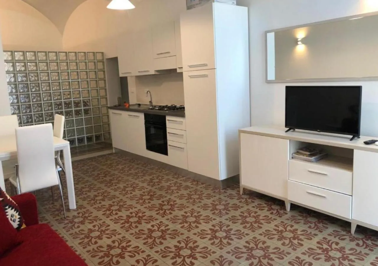 Communal lounge/ TV room in Hotel Ariston & Apartments