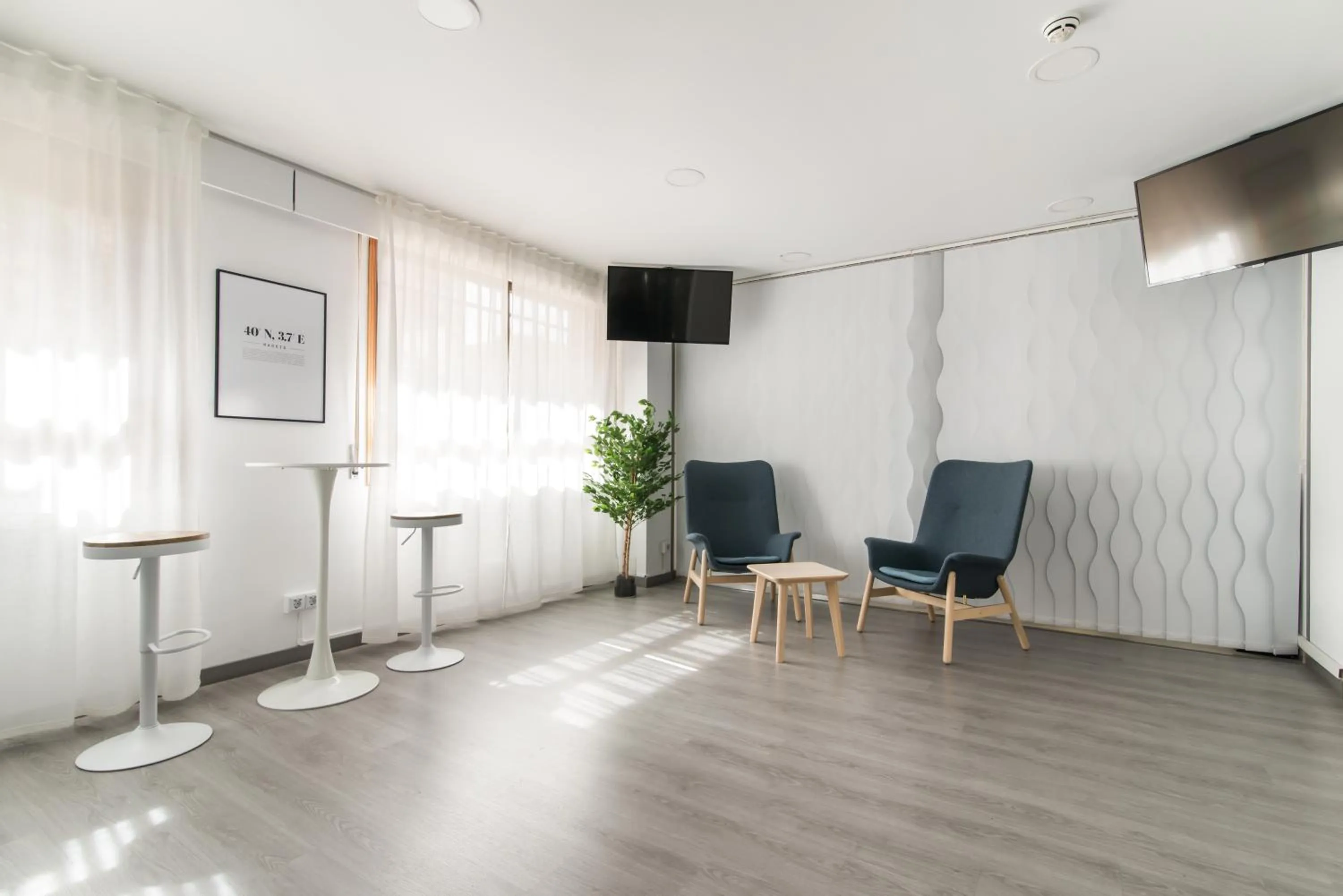 Communal lounge/ TV room in Roisa Hostal Boutique