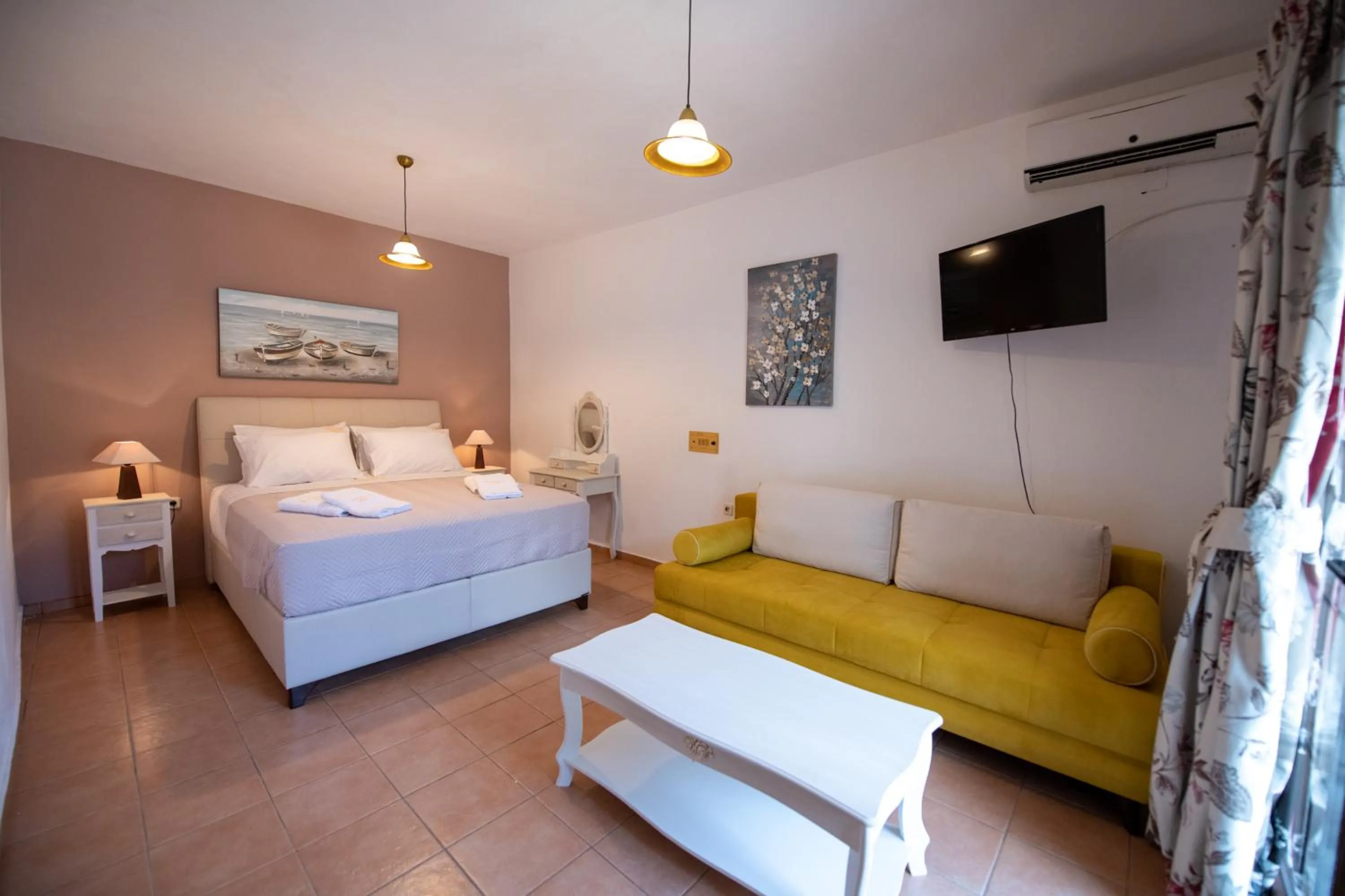 Bed in Hovolo Hotel Apartments