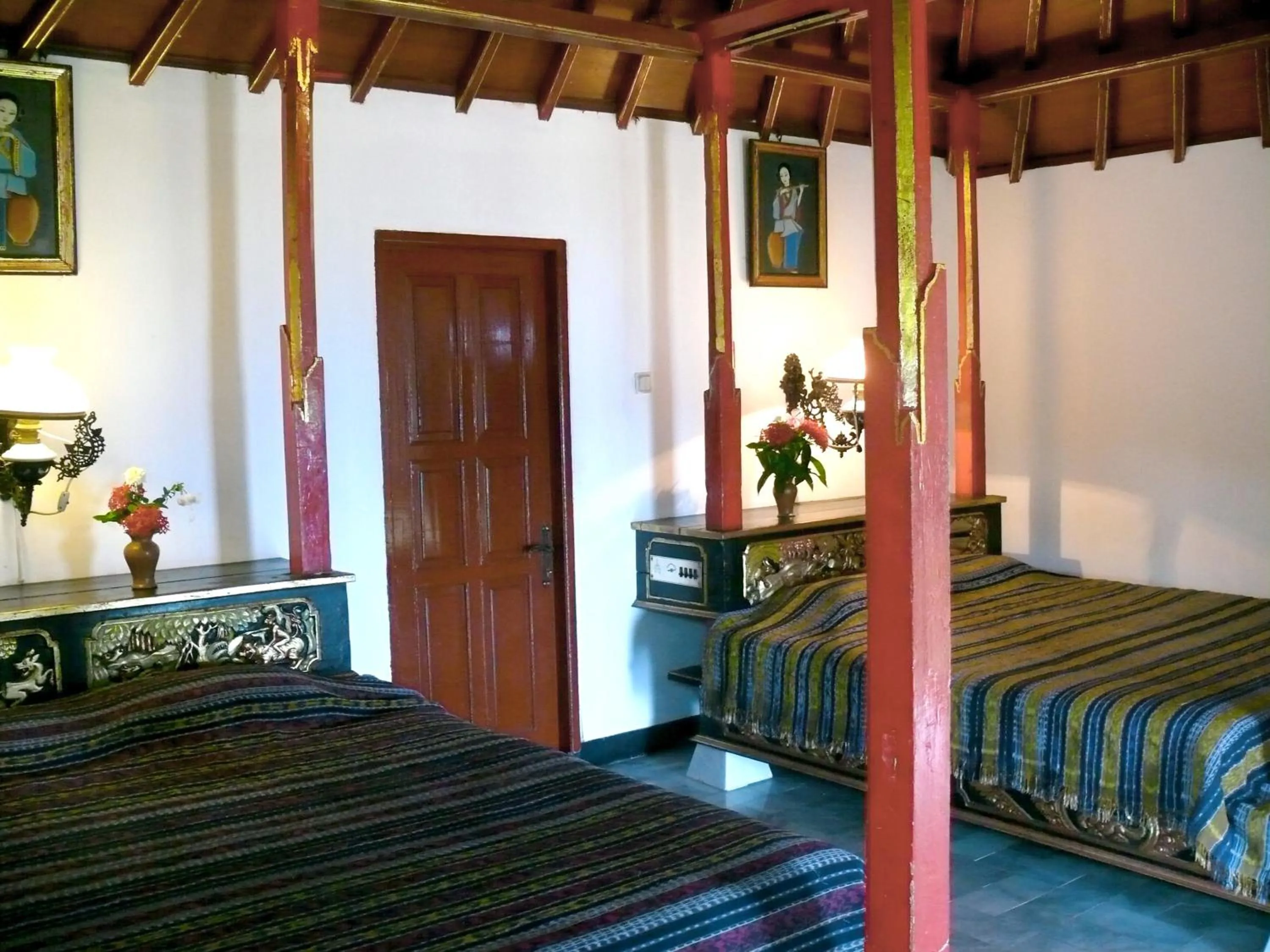 Photo of the whole room, Bed in Puri Bunga Beach Cottages