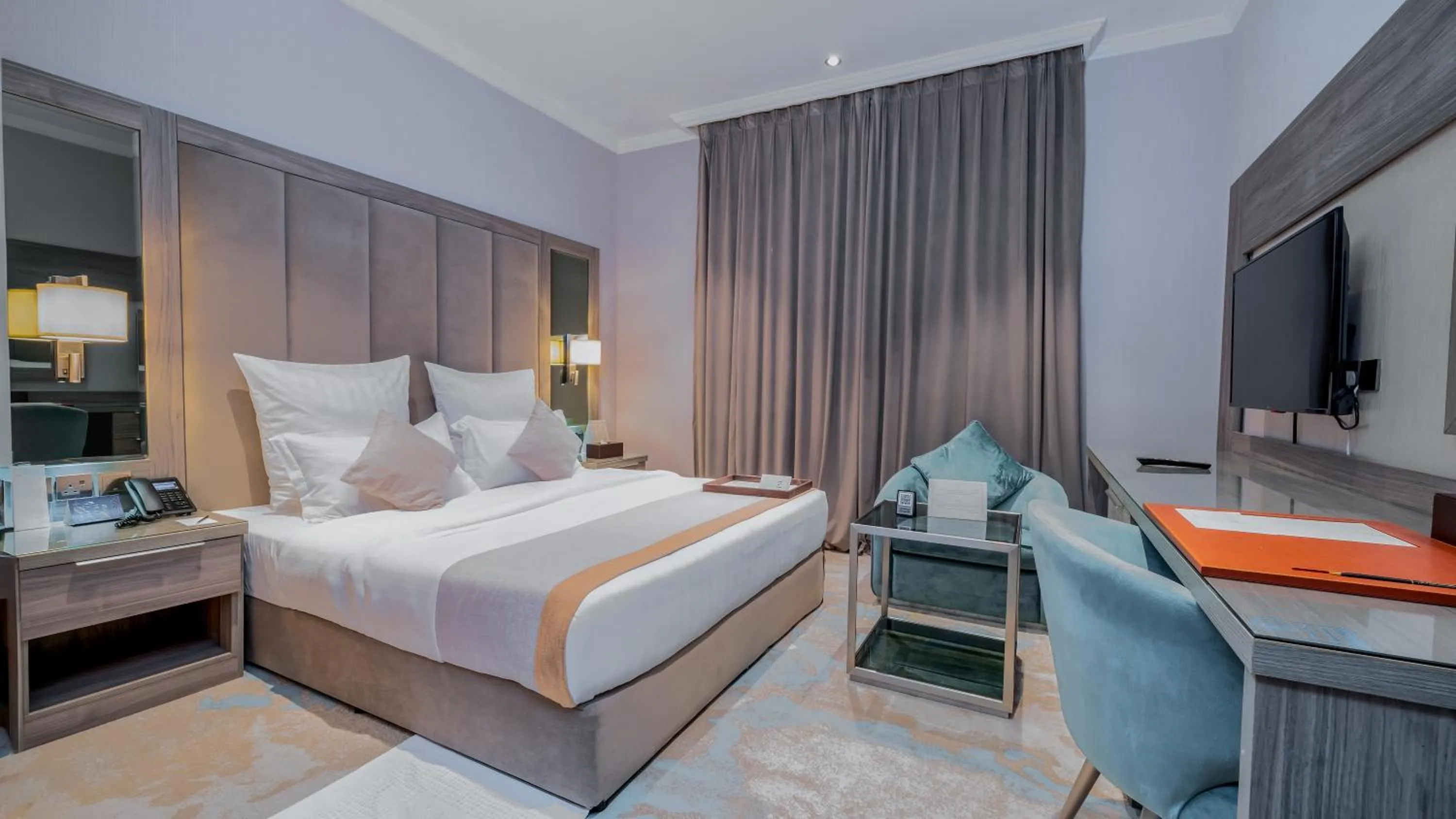 Bed in Madareem Hotel