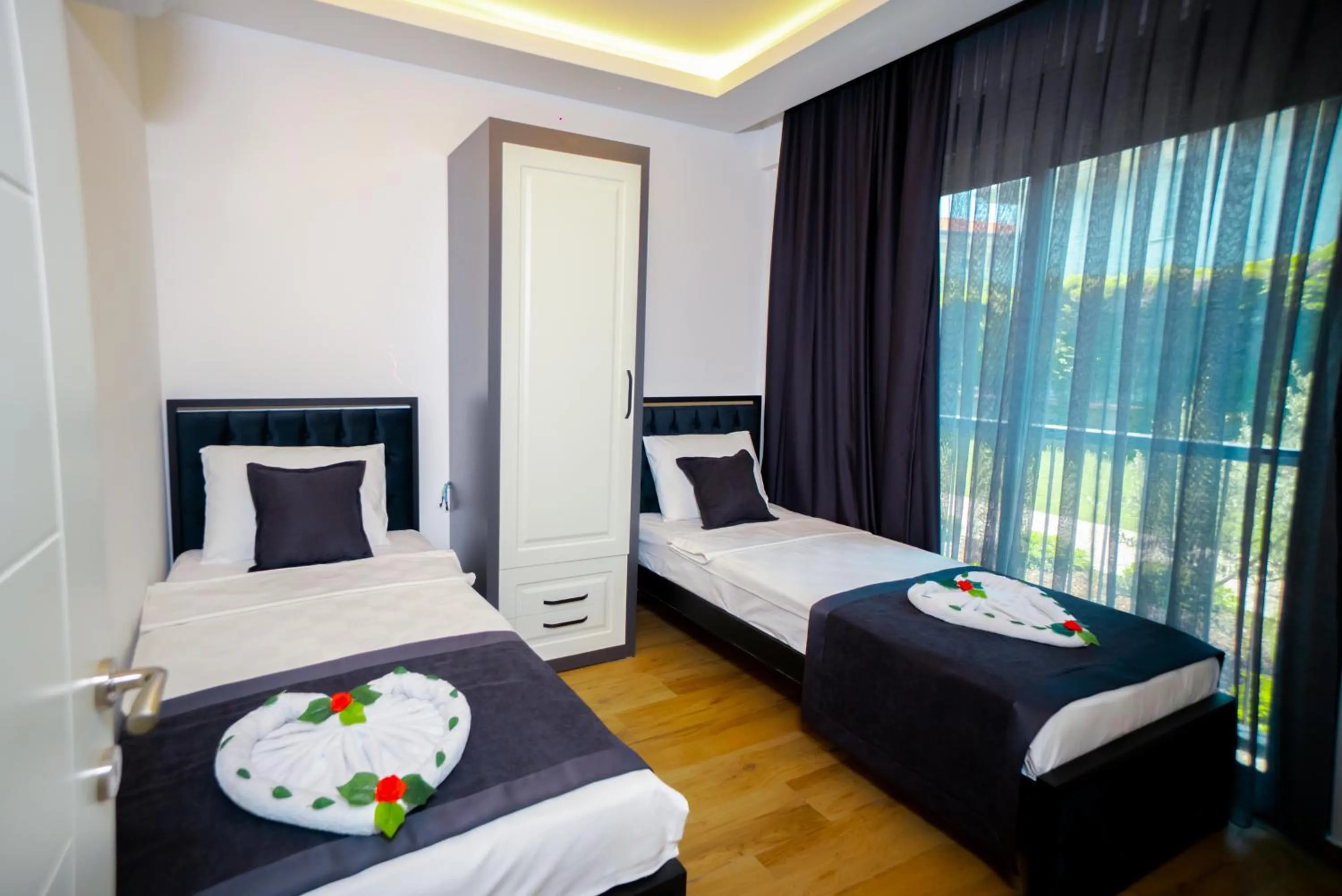 Bed in Sweet Home Kemer Apartments