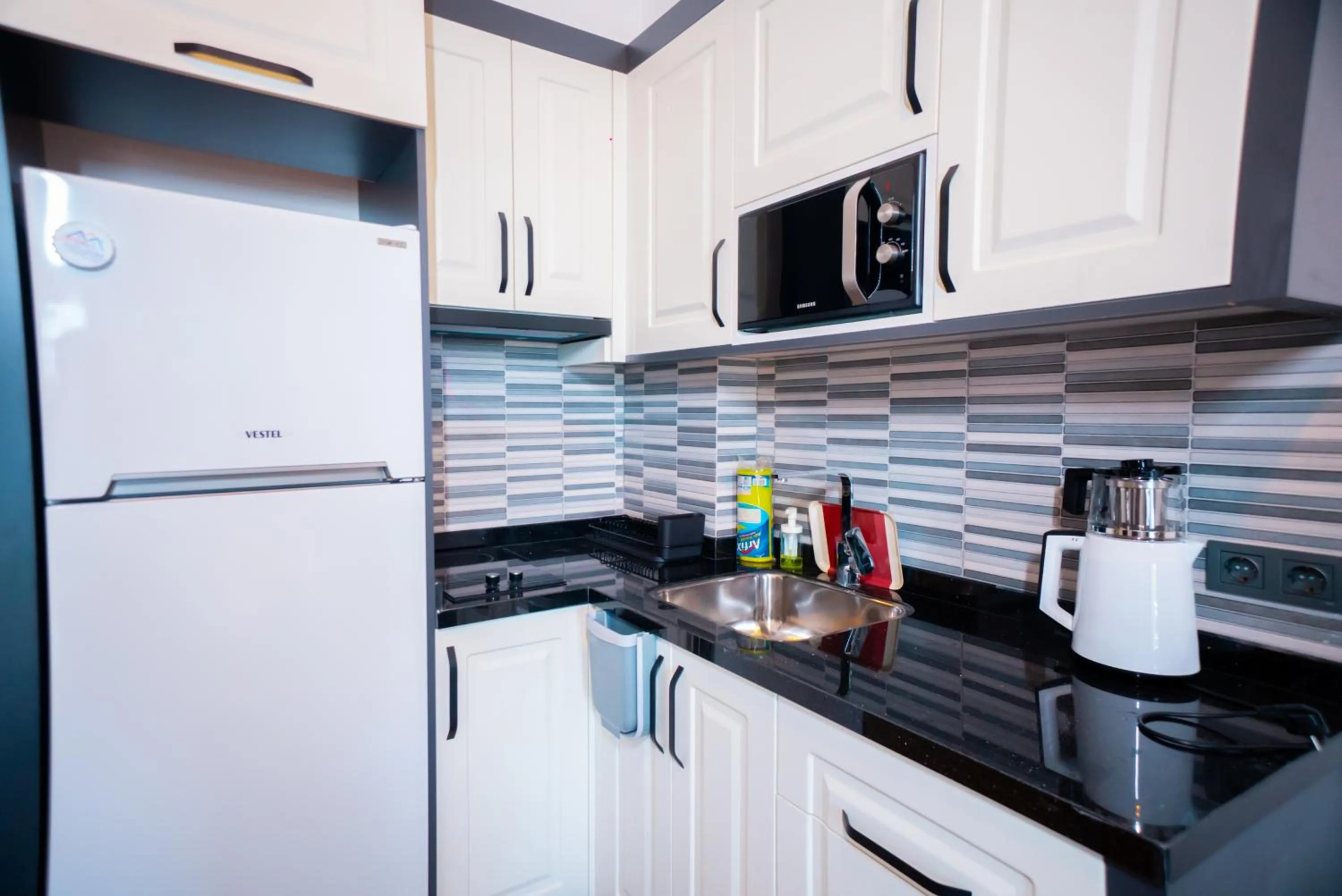 Kitchen or kitchenette in Sweet Home Kemer Apartments