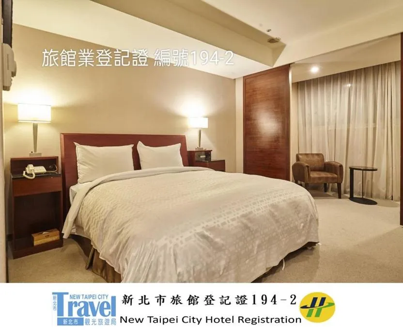 Bed in Family Hotel Taipei