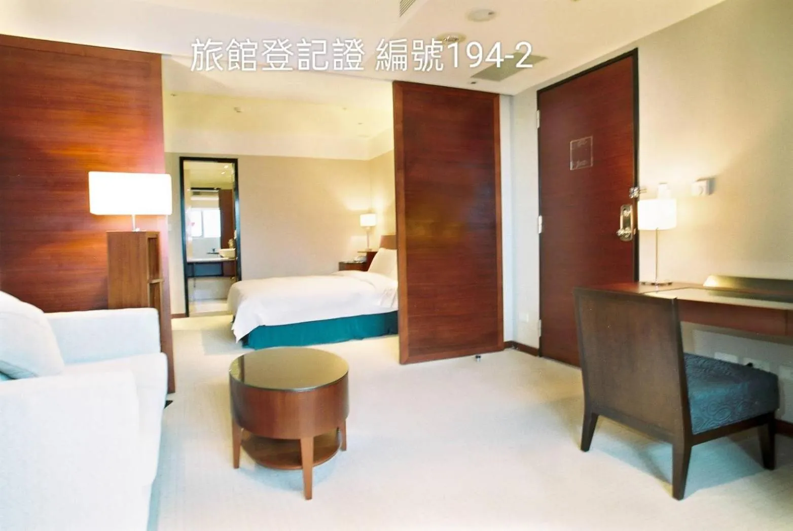 Bed in Family Hotel Taipei