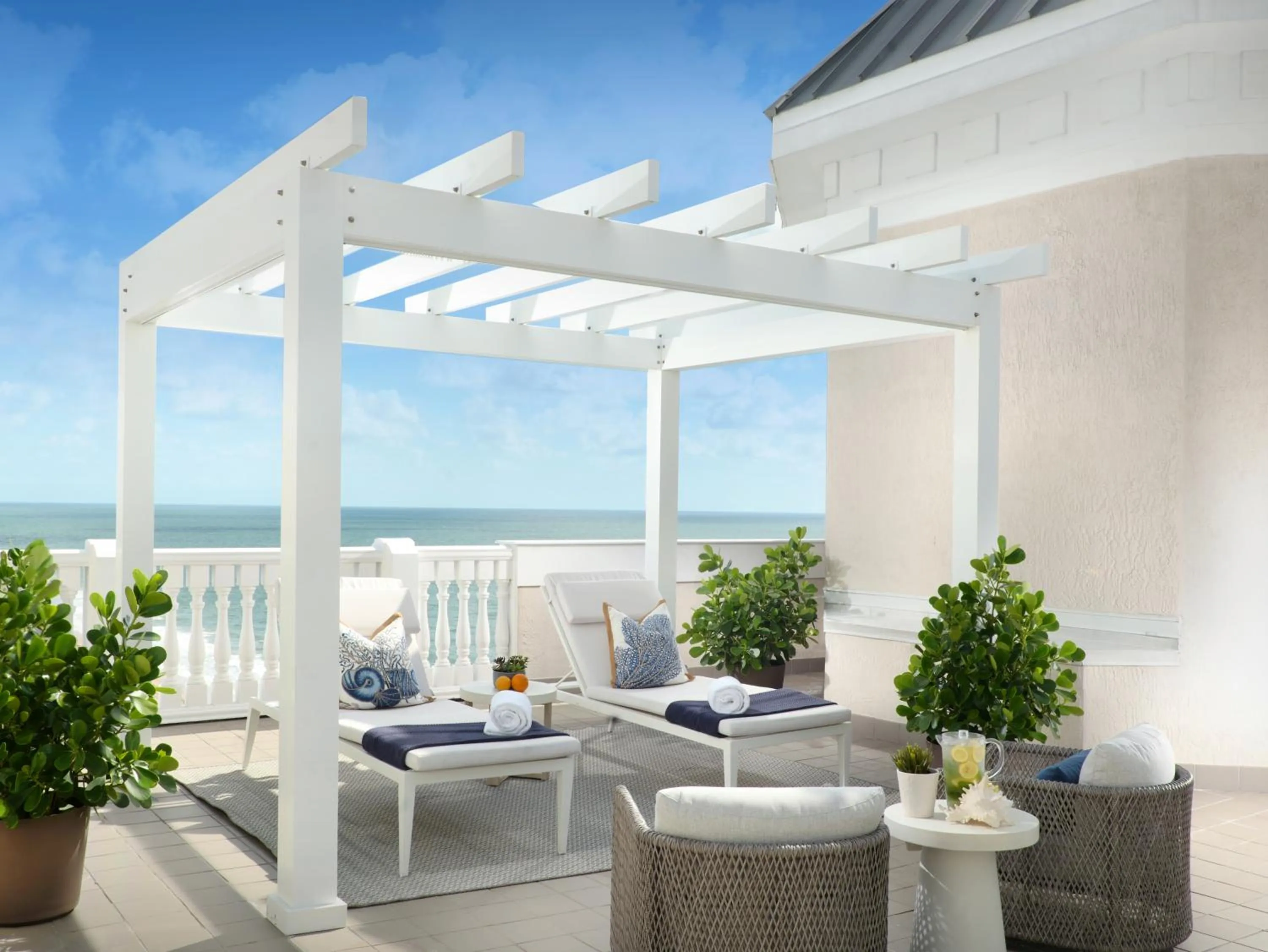 Patio in Pelican Grand Beach Resort, a Noble House Resort