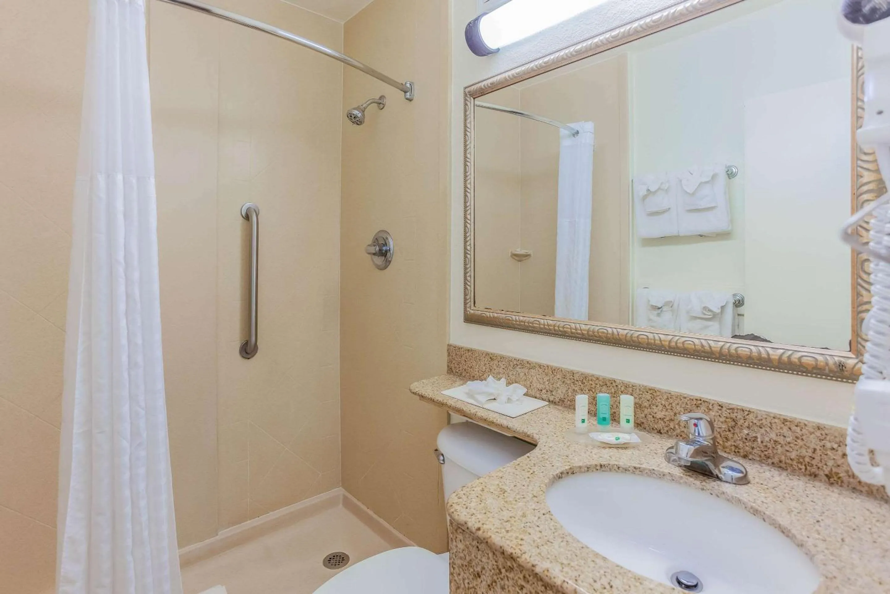 Shower in Beachside Hotel & Suites Cocoa Beach - Port Canaveral