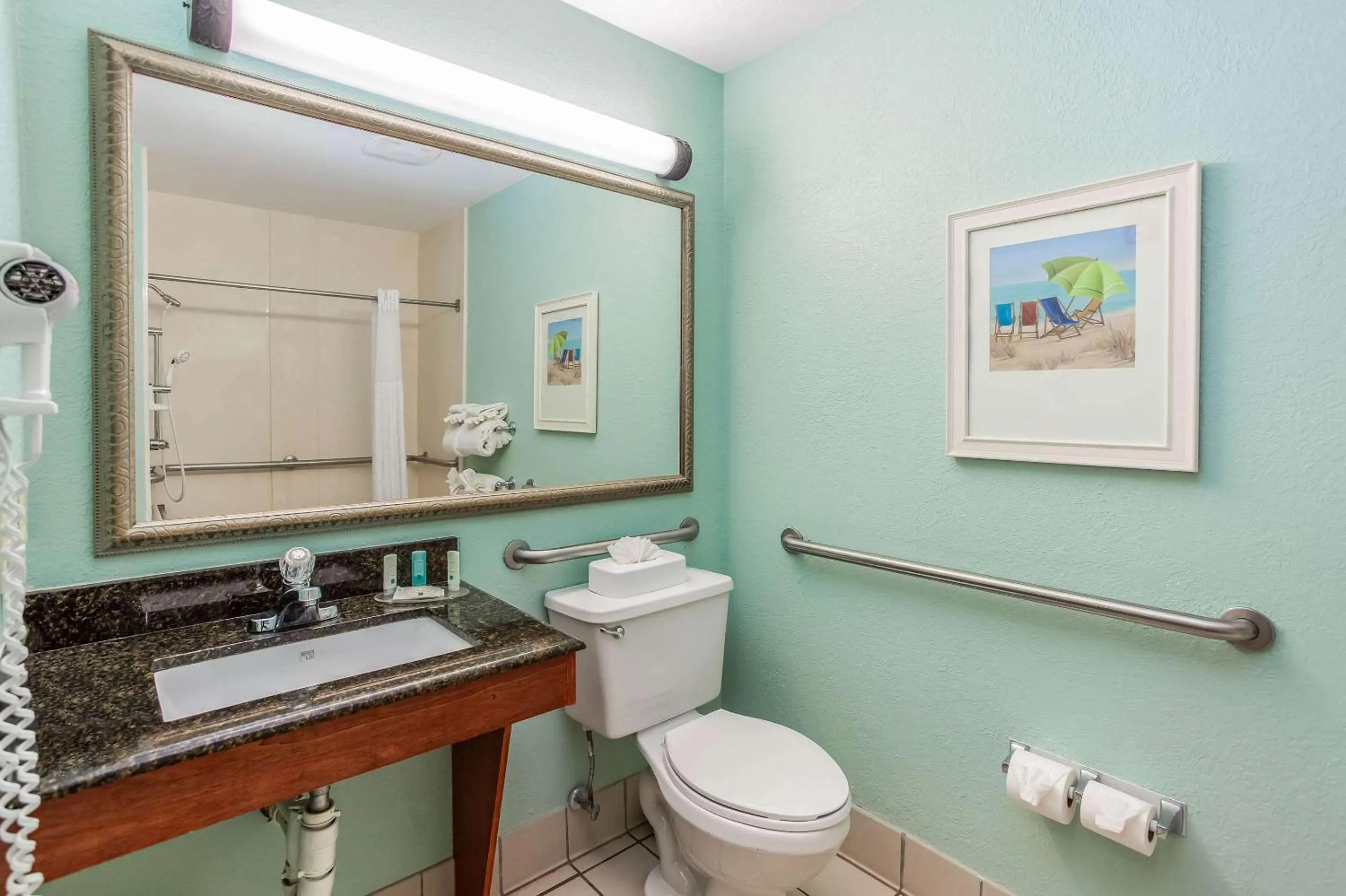Shower in Beachside Hotel & Suites Cocoa Beach - Port Canaveral