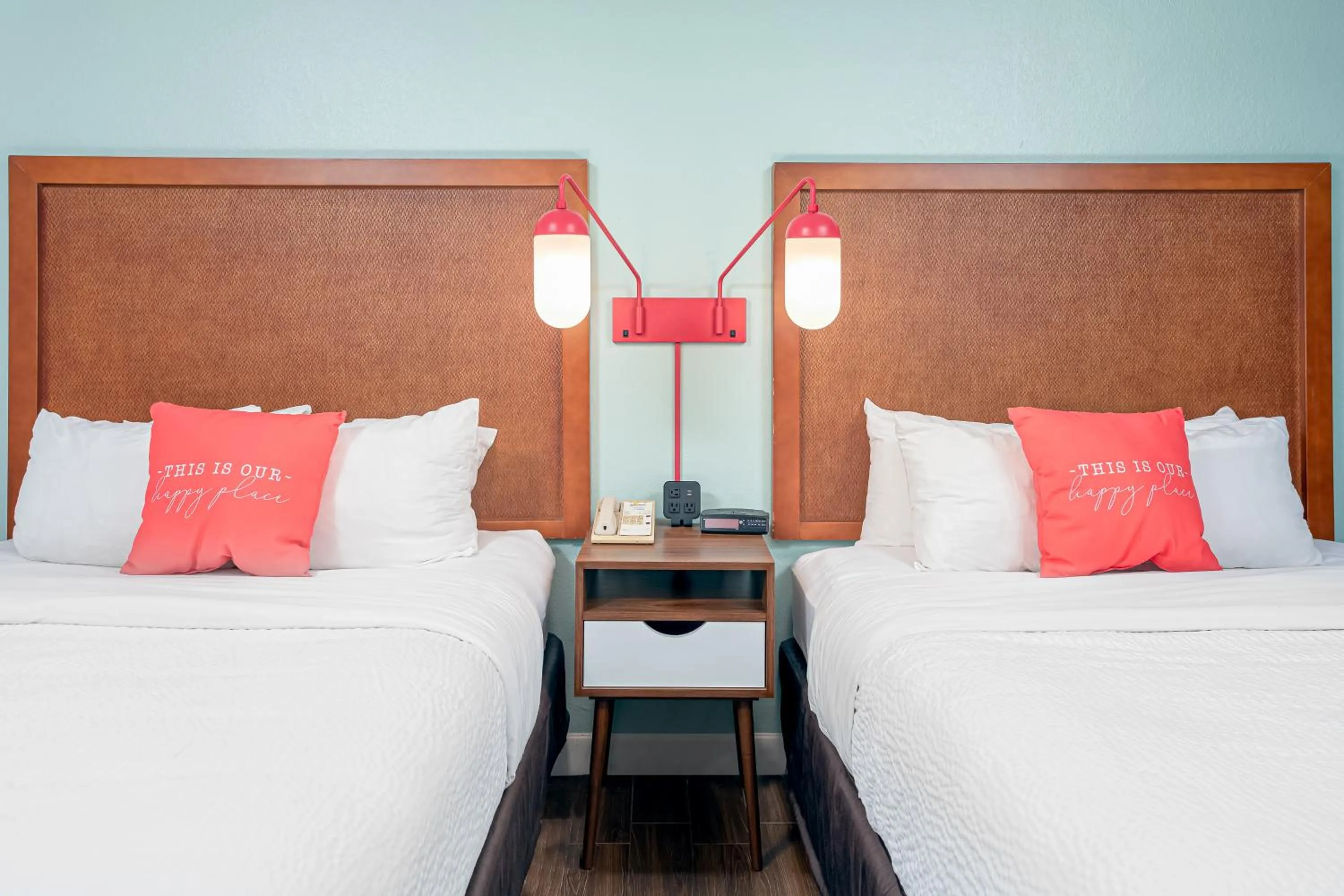 Bed in Beachside Hotel & Suites Cocoa Beach - Port Canaveral