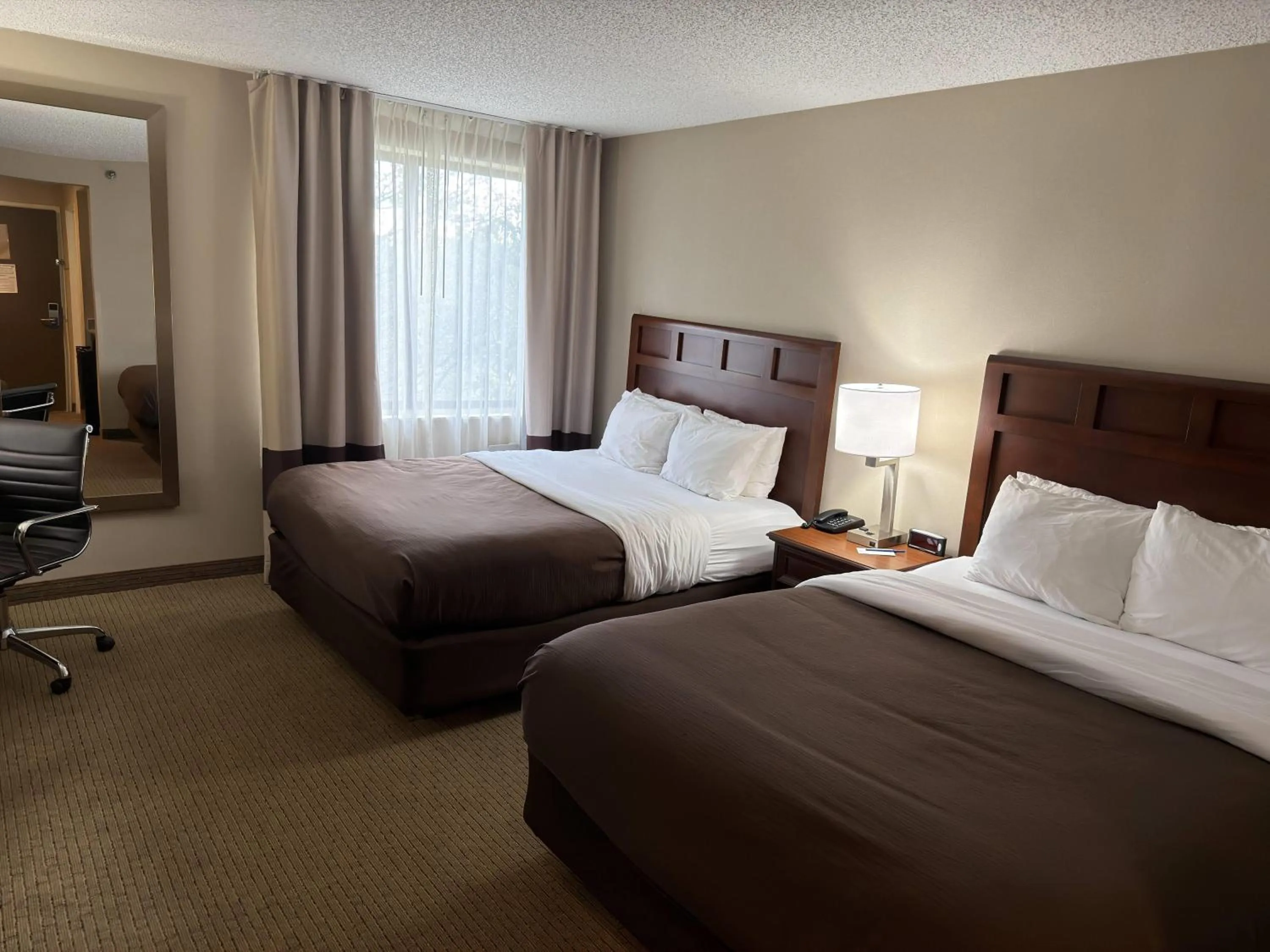 Photo of the whole room in Wingate by Wyndham Utica