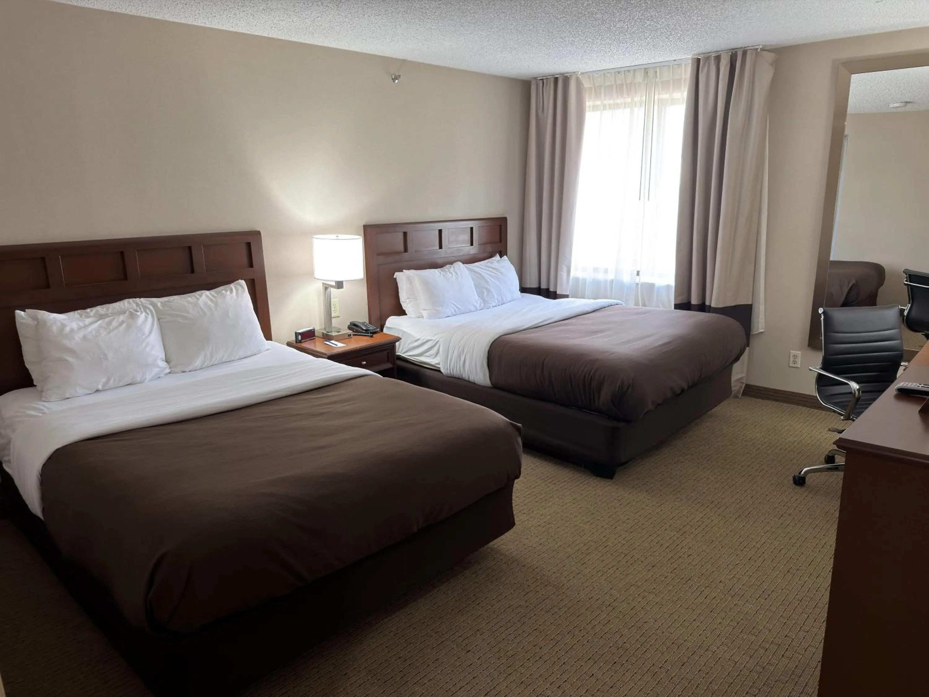 Photo of the whole room in Wingate by Wyndham Utica