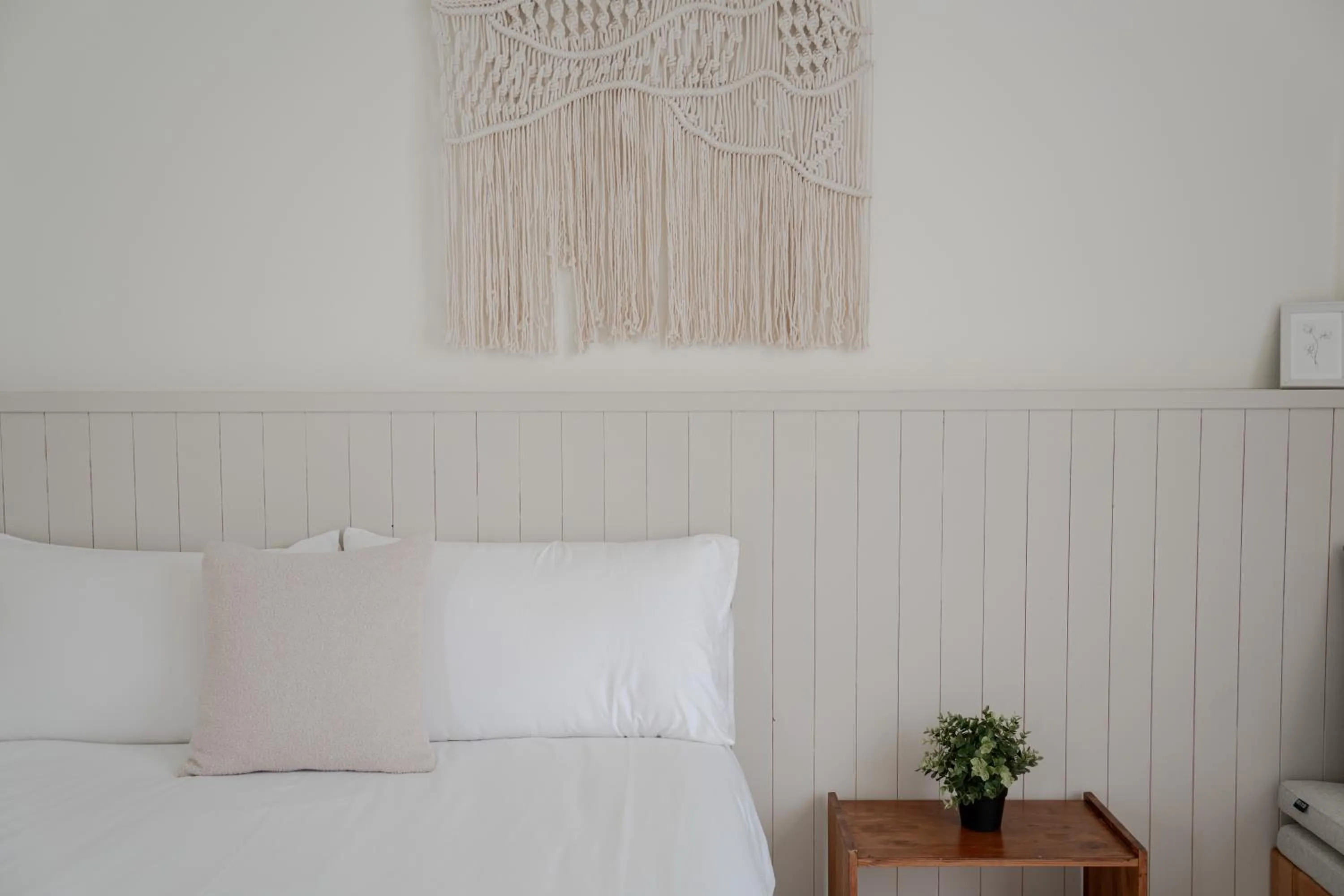 Bed in Cozy Green Guesthouse