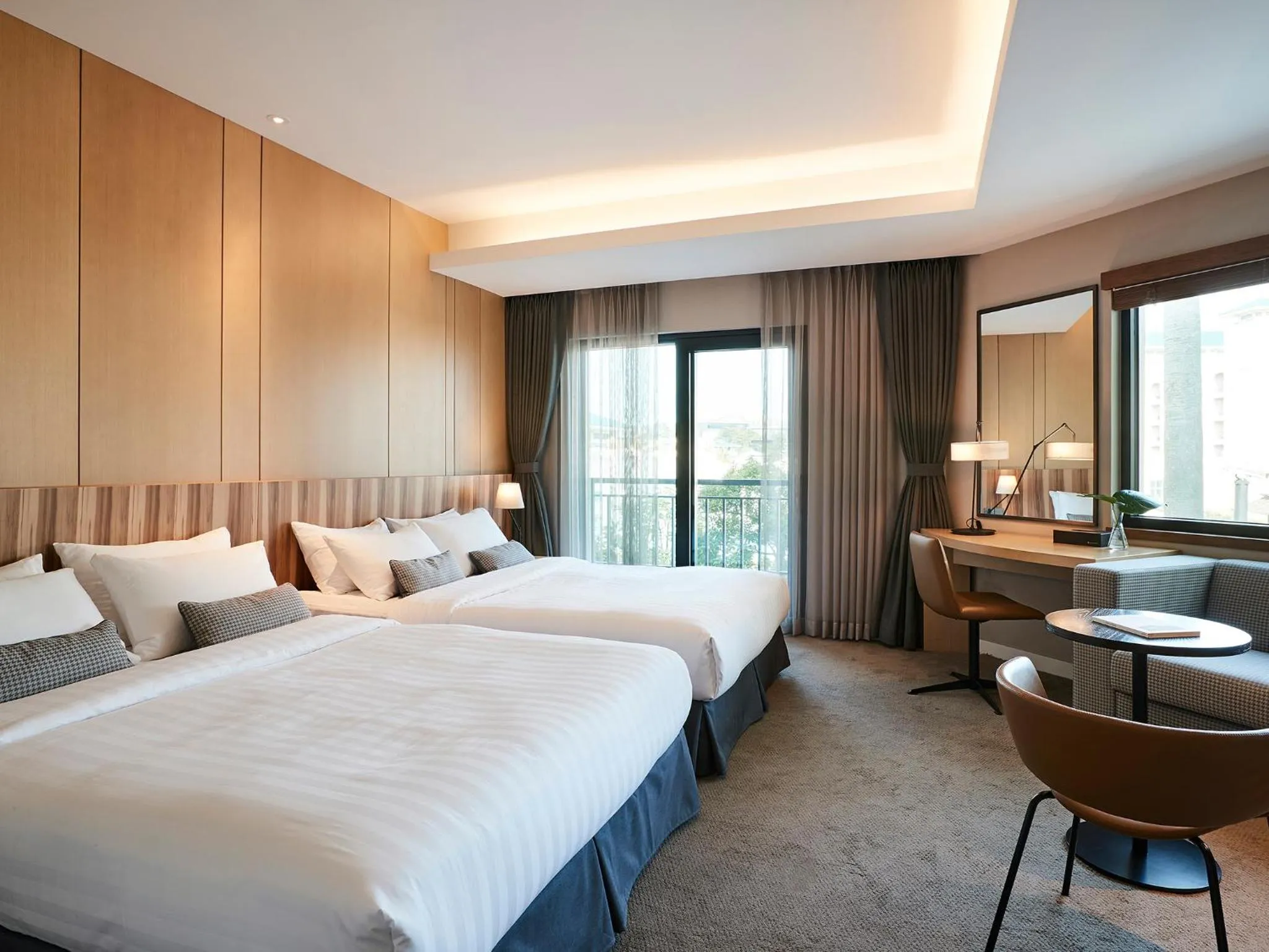 Bed in The Suites Hotel Jeju