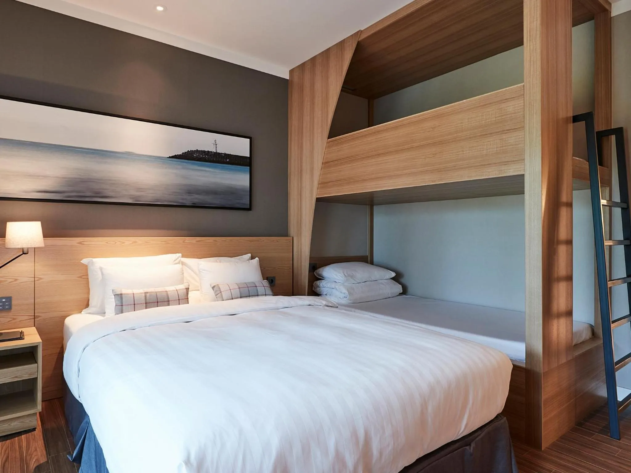 Bed in The Suites Hotel Jeju