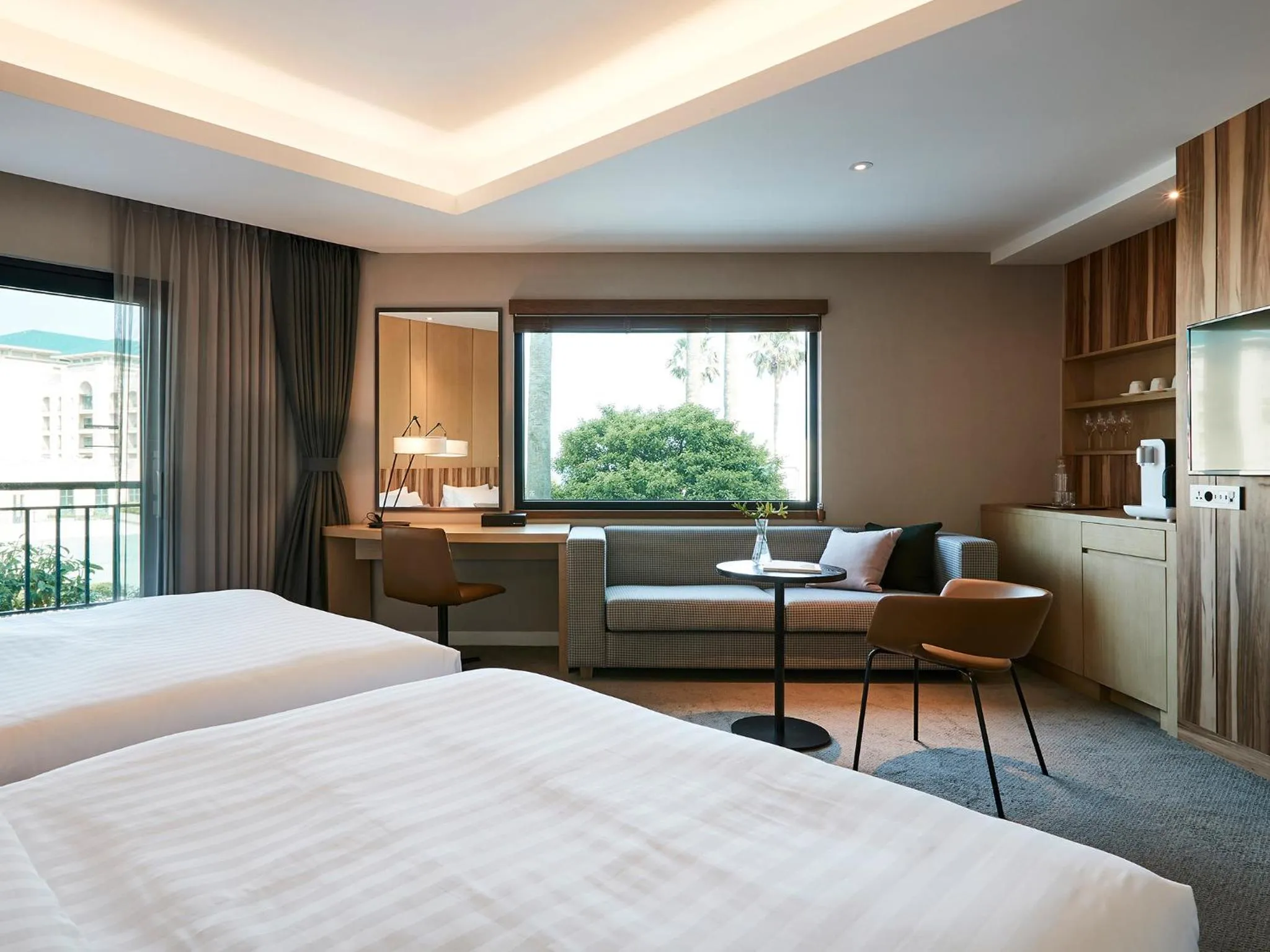 Bed in The Suites Hotel Jeju