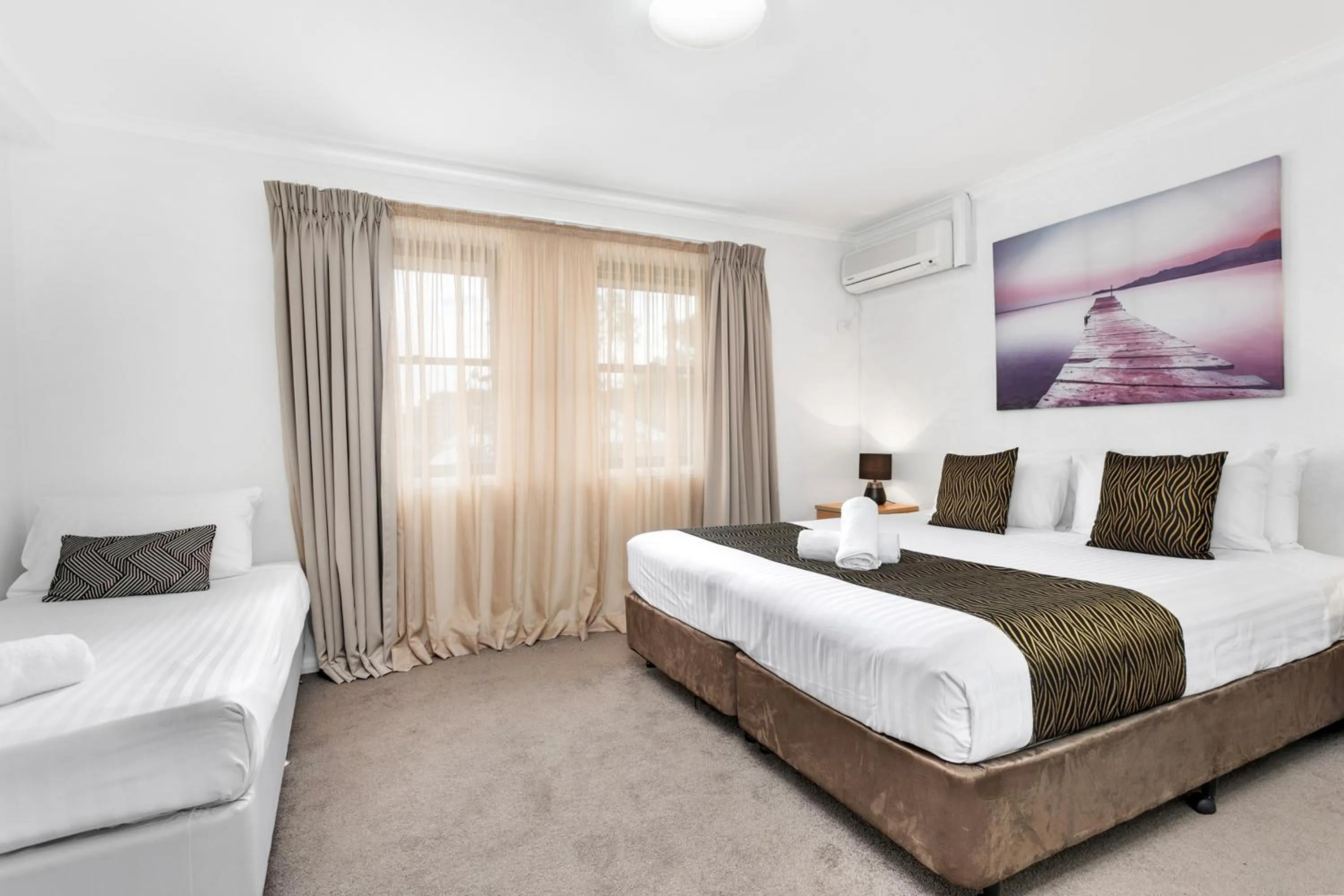 Photo of the whole room, Bed in Peninsula Nelson Bay Motel and Serviced Apartments