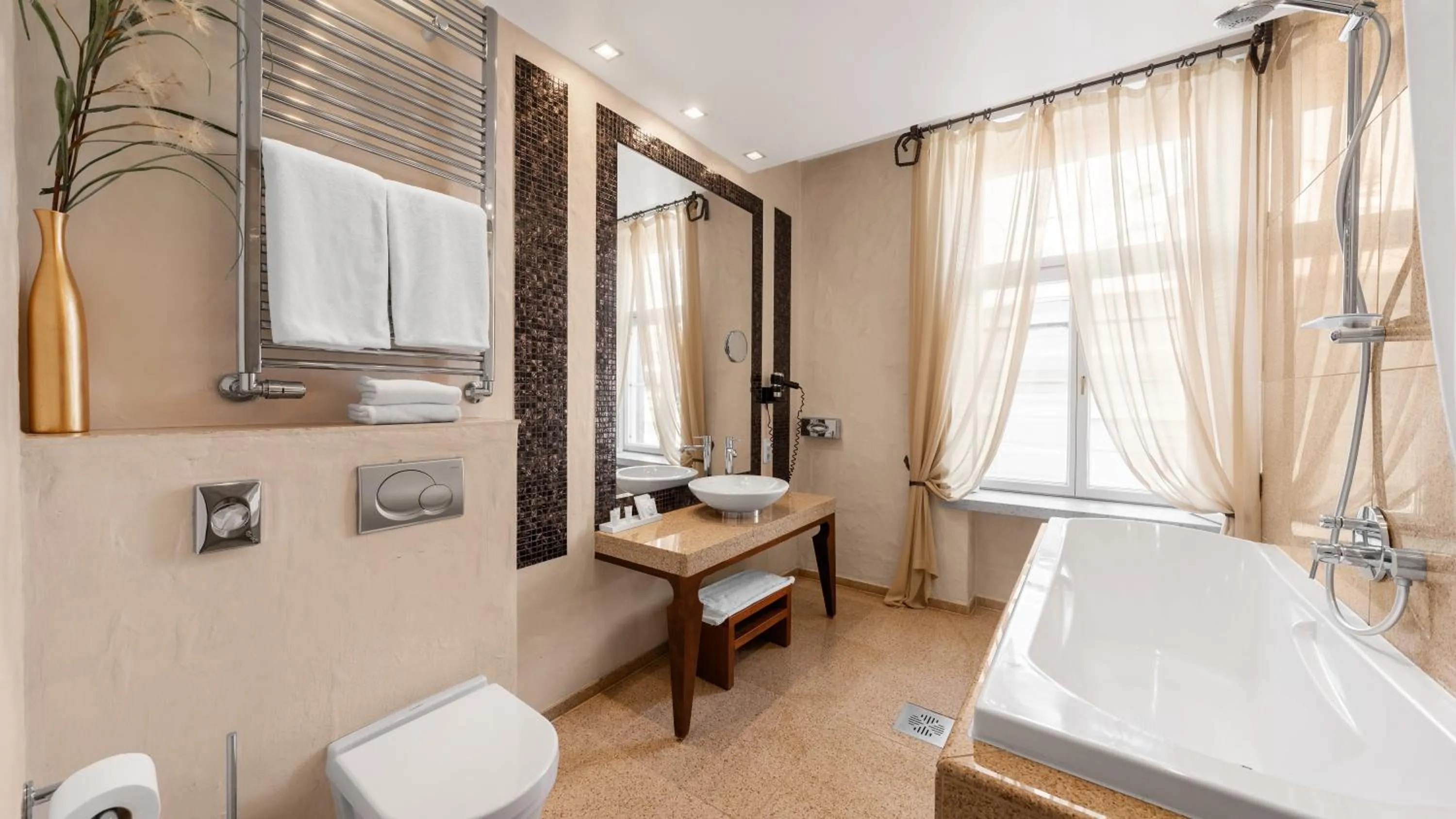 Shower in Rixwell Collection Savoy Boutique Hotel