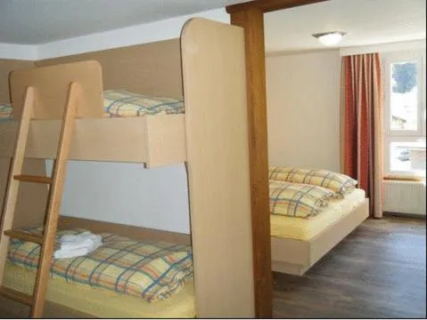 Bed in Hotel Des Alpes