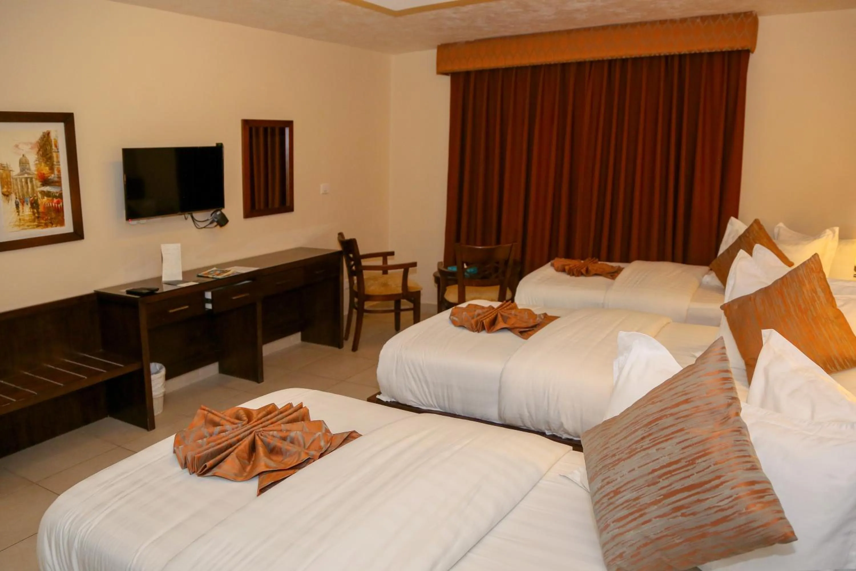 Bed in City Tower Hotel