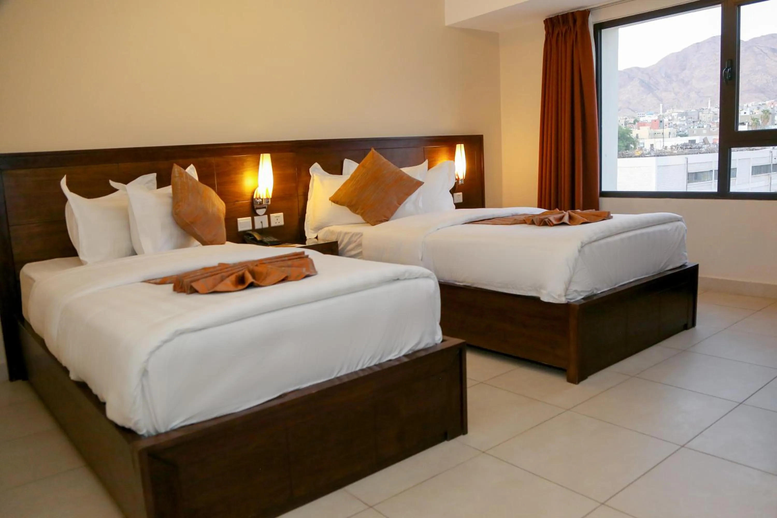 Bed in City Tower Hotel