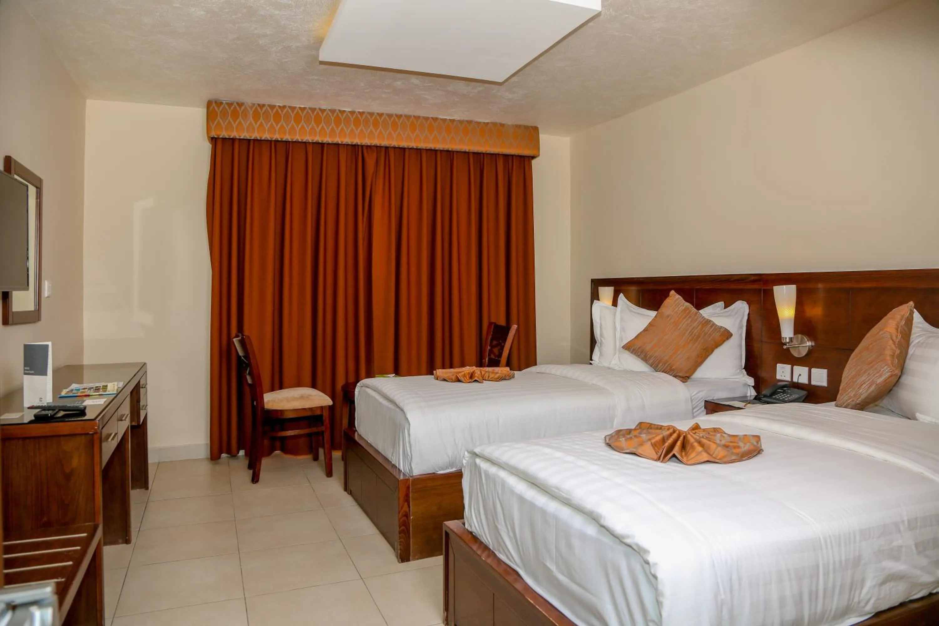 Bed in City Tower Hotel