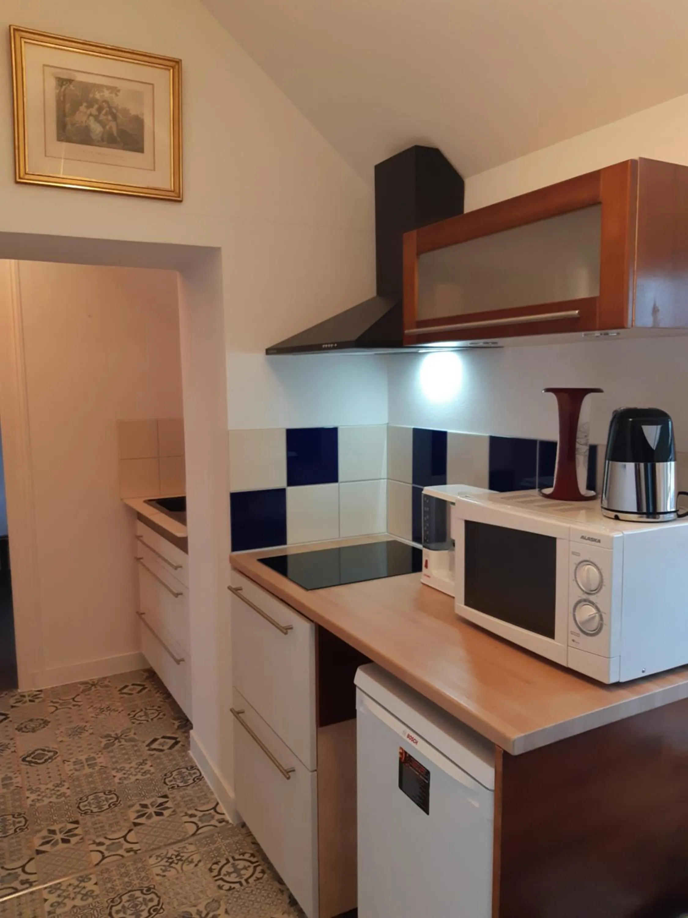 Kitchen or kitchenette in Maison des Isles