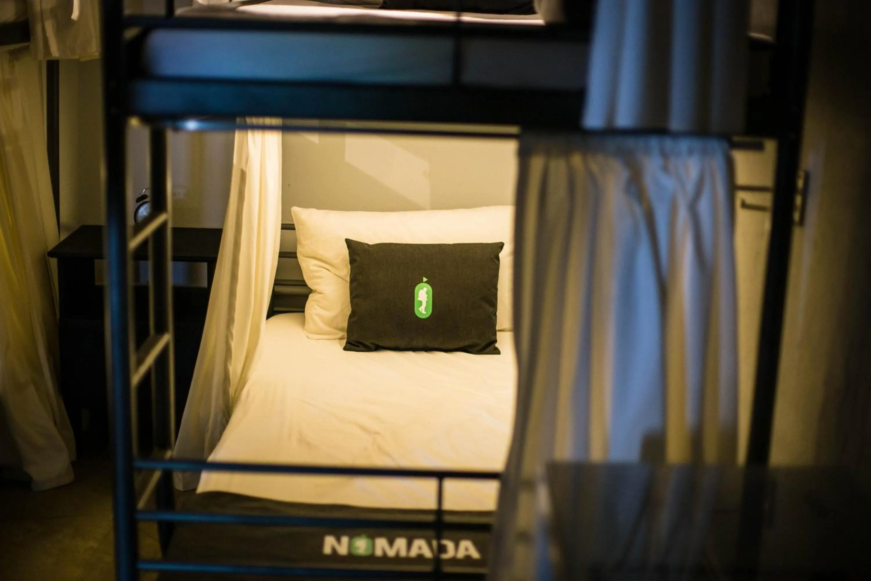 bunk bed, Bed in Nomada Urban Beach Hostel- Calle Loiza