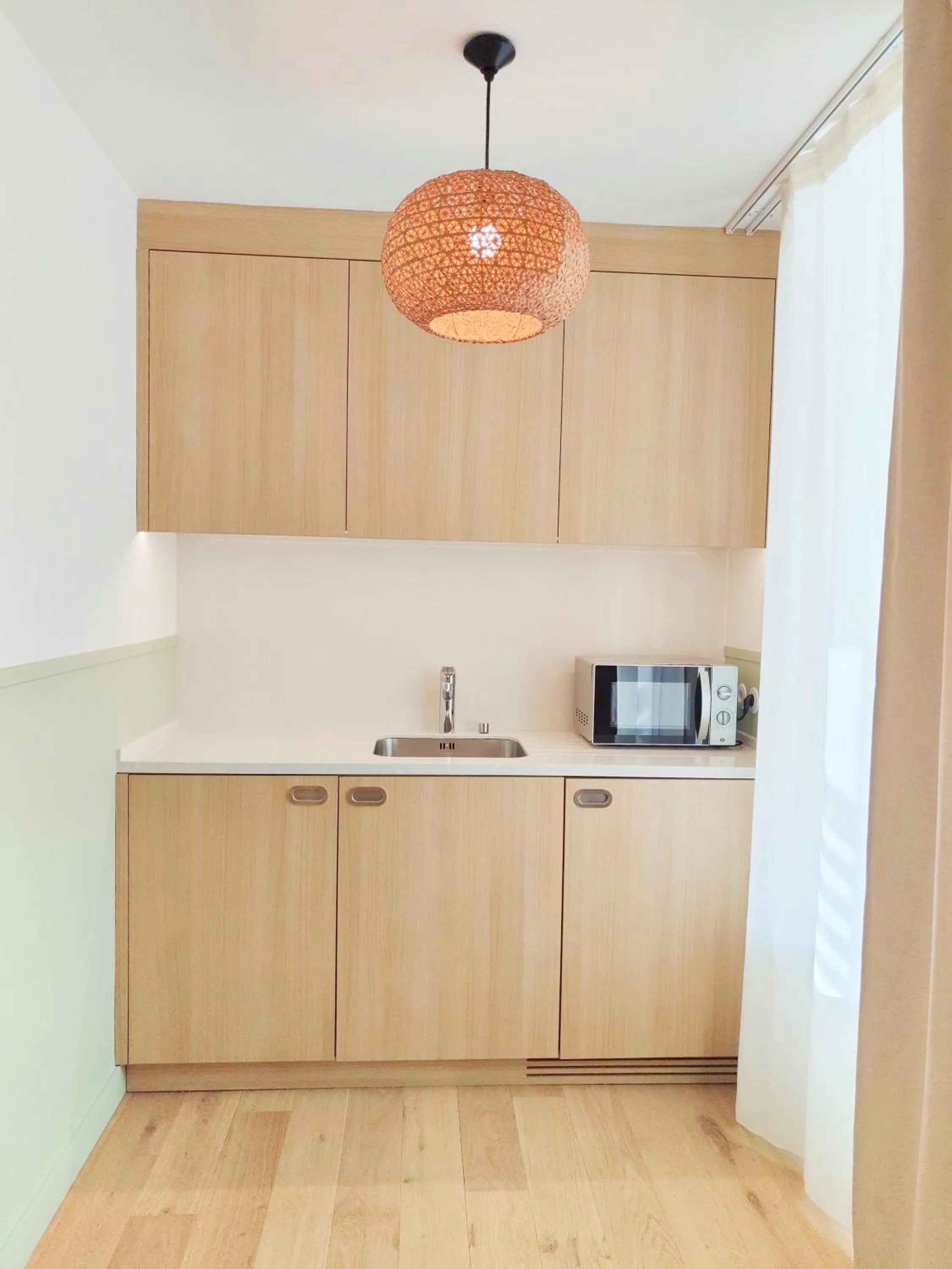 Kitchen or kitchenette in Hôtel Les Grenettes