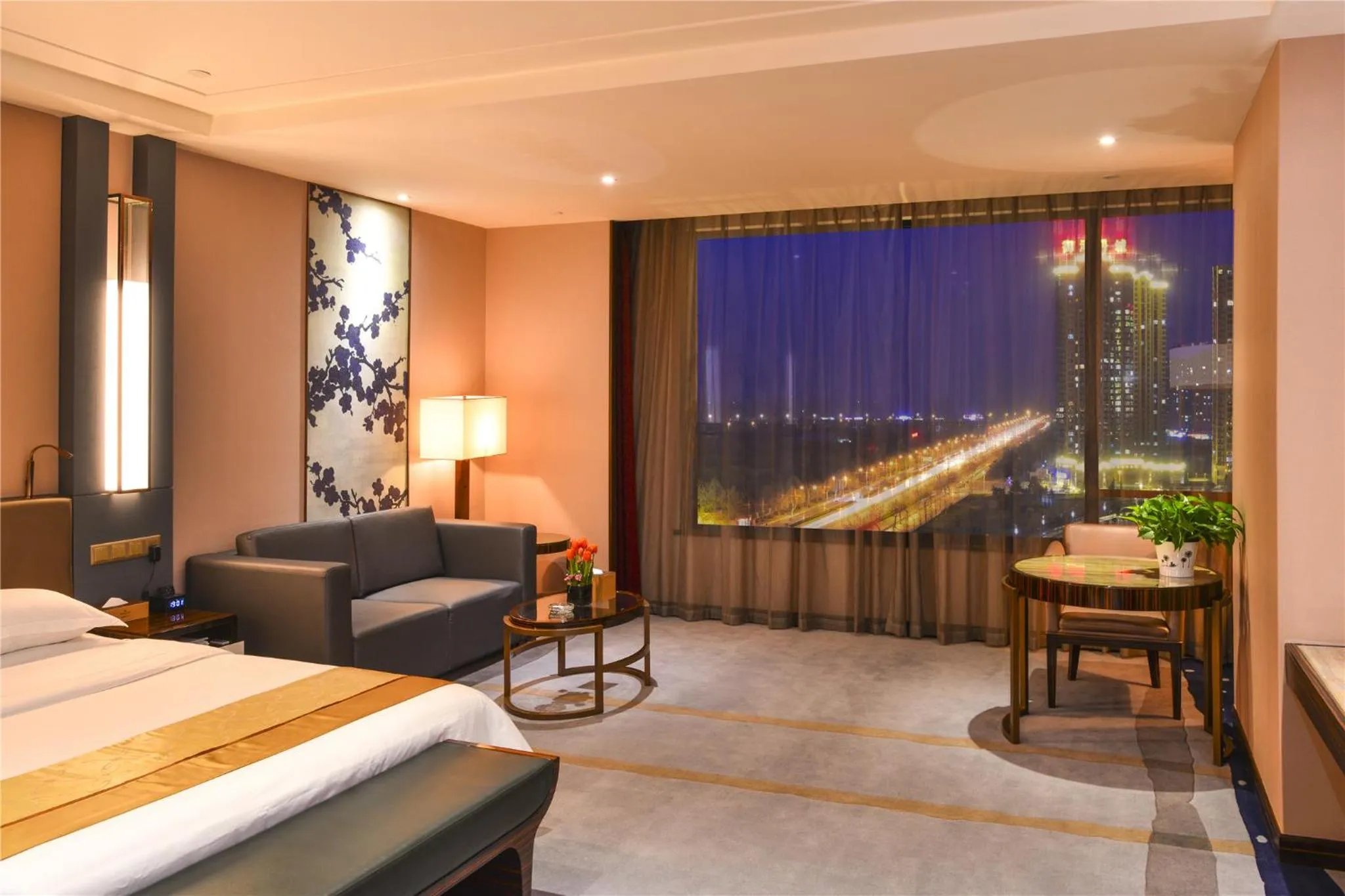 Living room, Bed in Ramada Heze