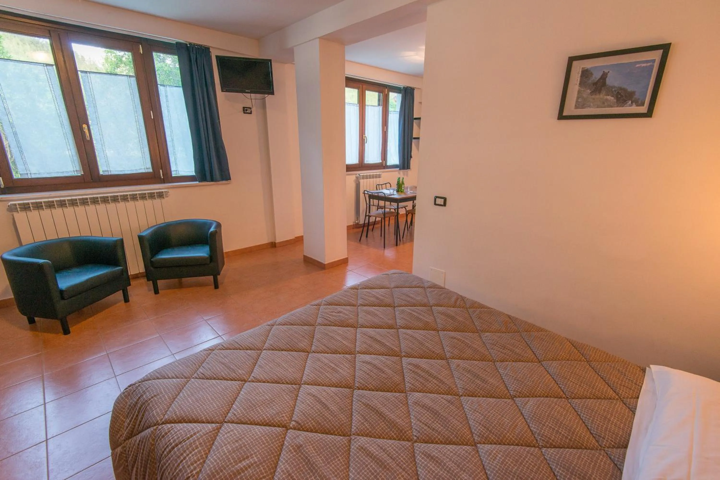 Kitchen or kitchenette, Bed in Albergo Della Corte