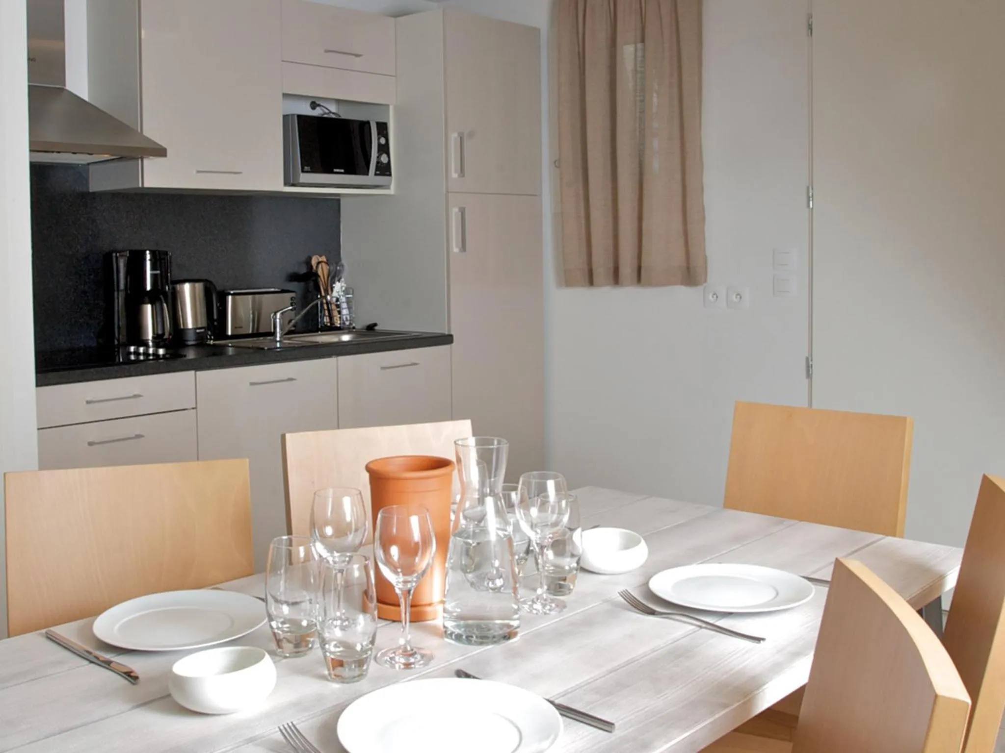 Kitchen or kitchenette in Lagrange Vacances Le Village de la Mer