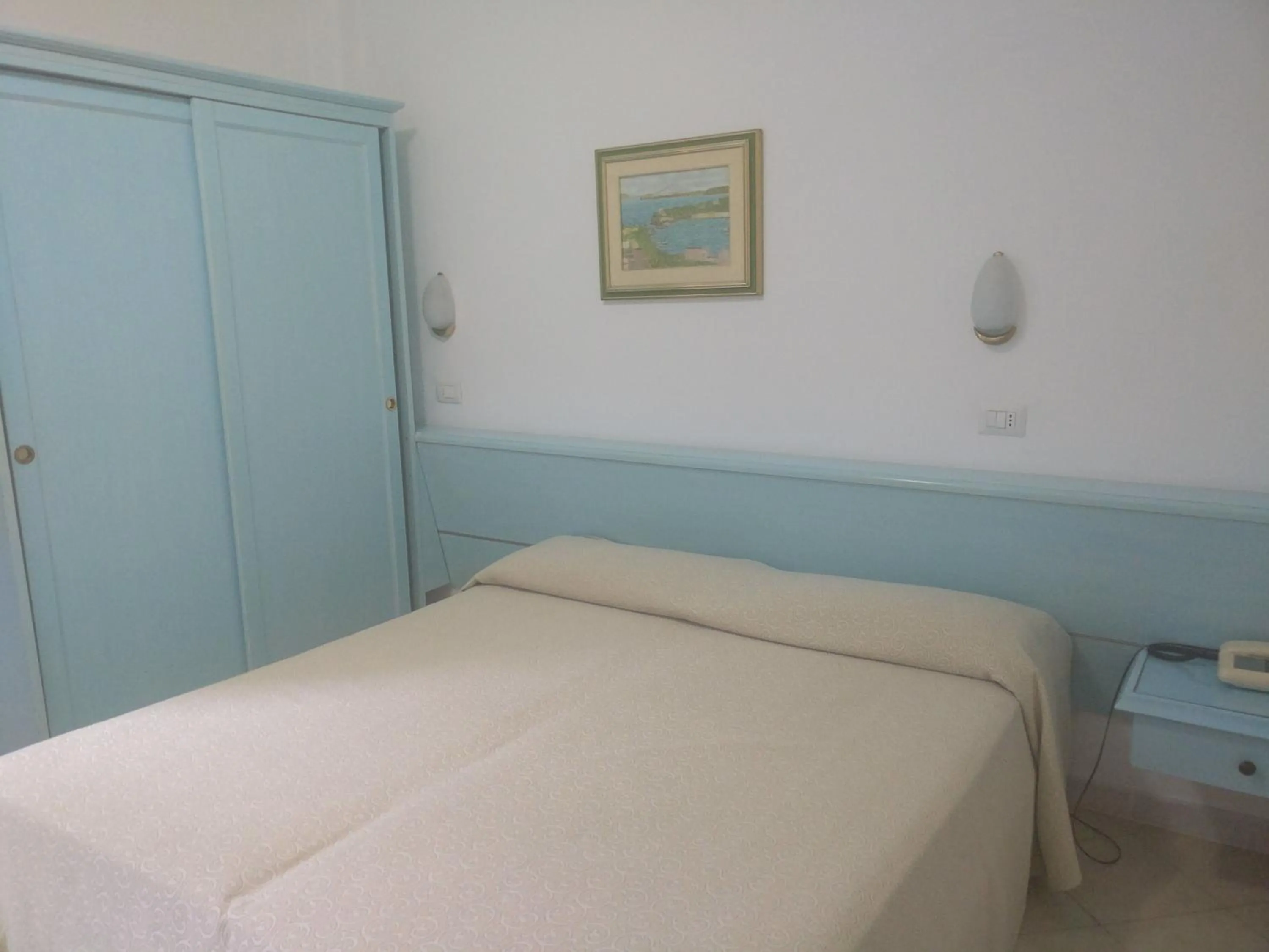 Bed in Hotel Eugenio