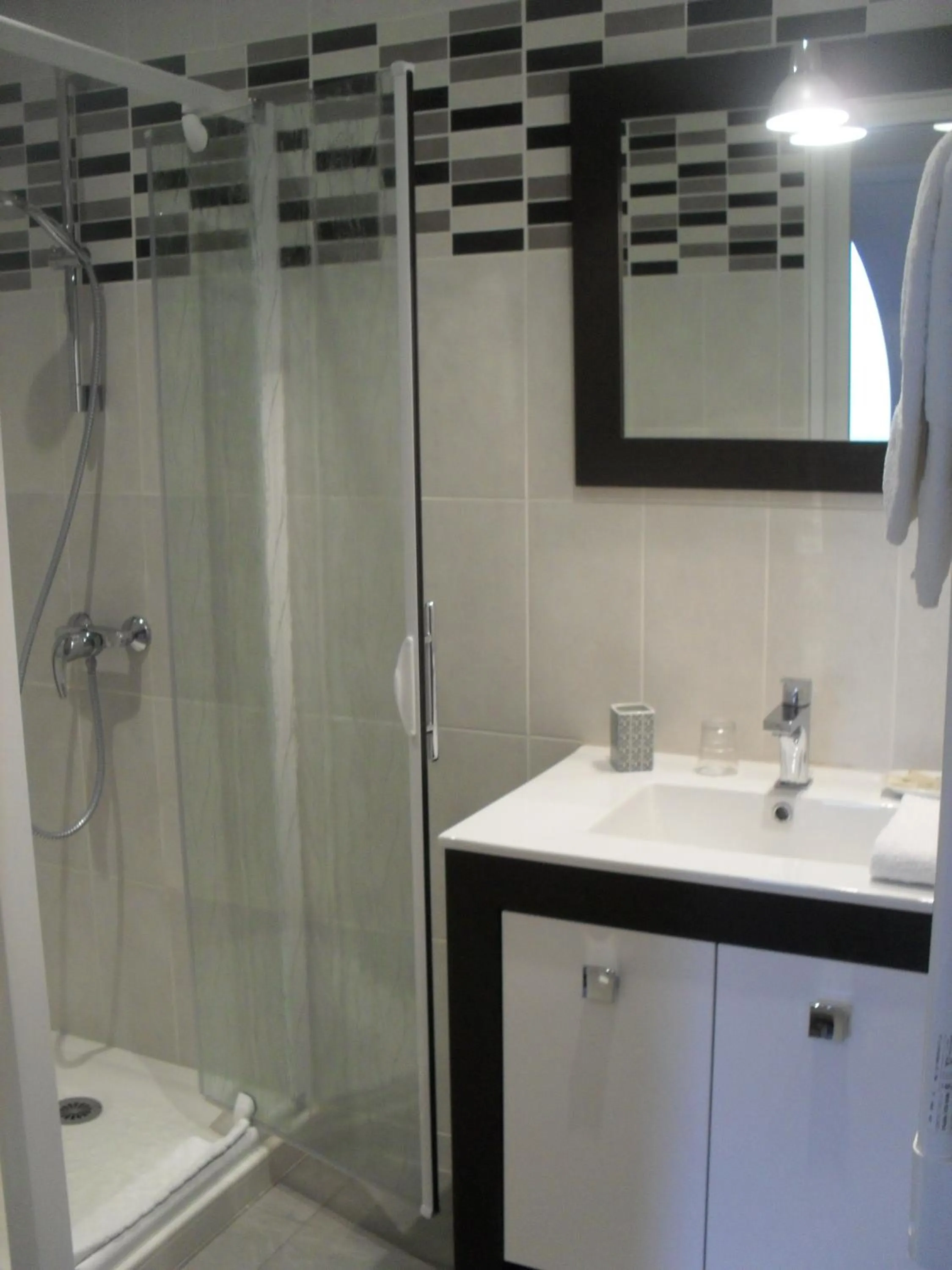 Bathroom in Logis Hôtel Andreinia & Cabanes