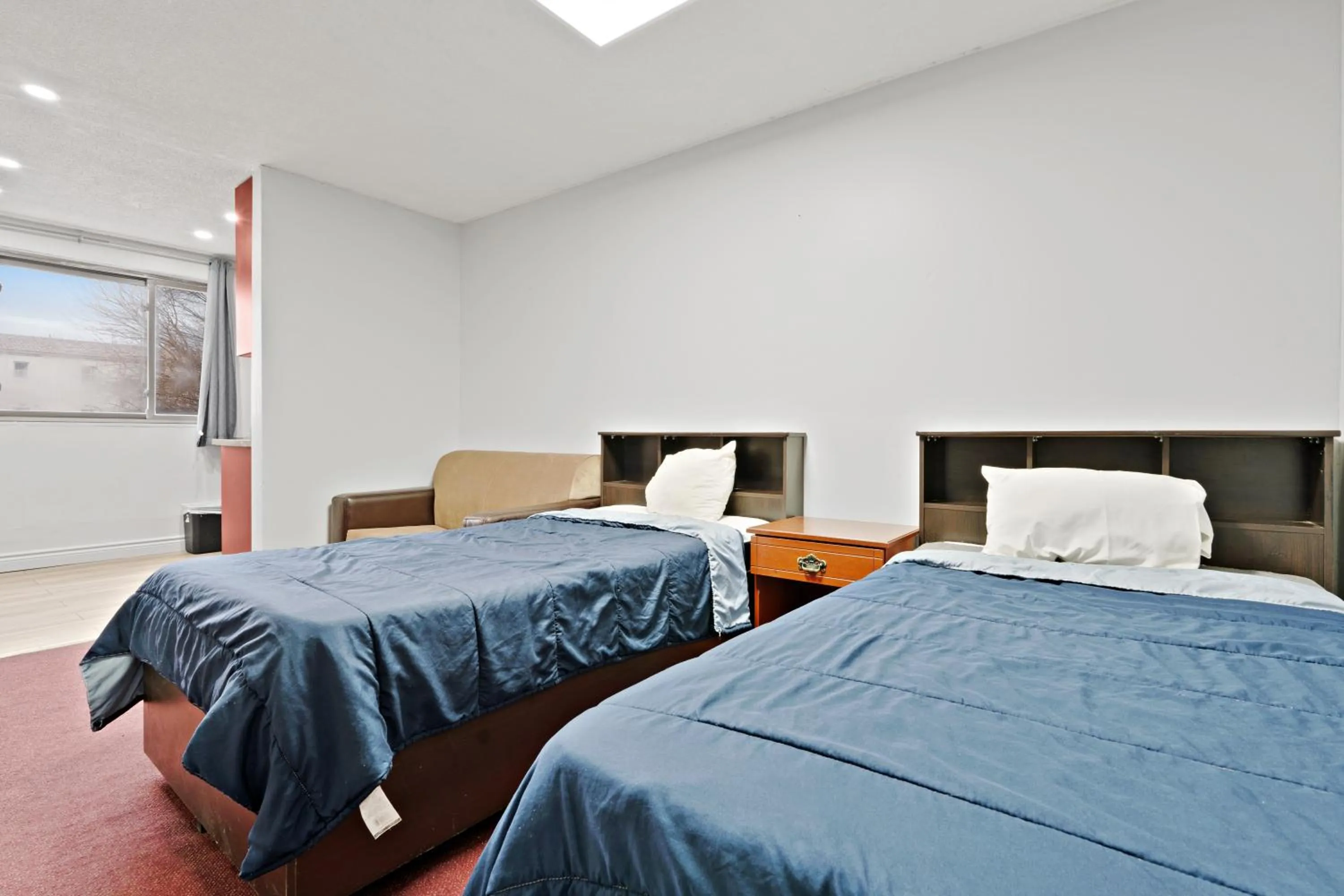 Bedroom, Bed in Niagara Lodge & Suites