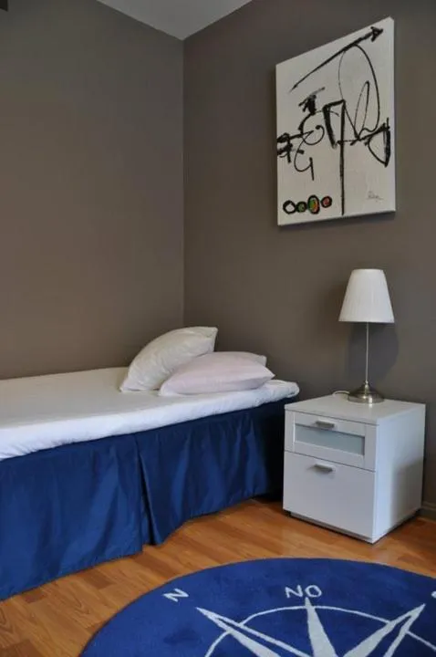 Bed in Strand Hotell