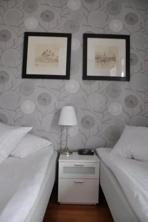 Bed in Strand Hotell