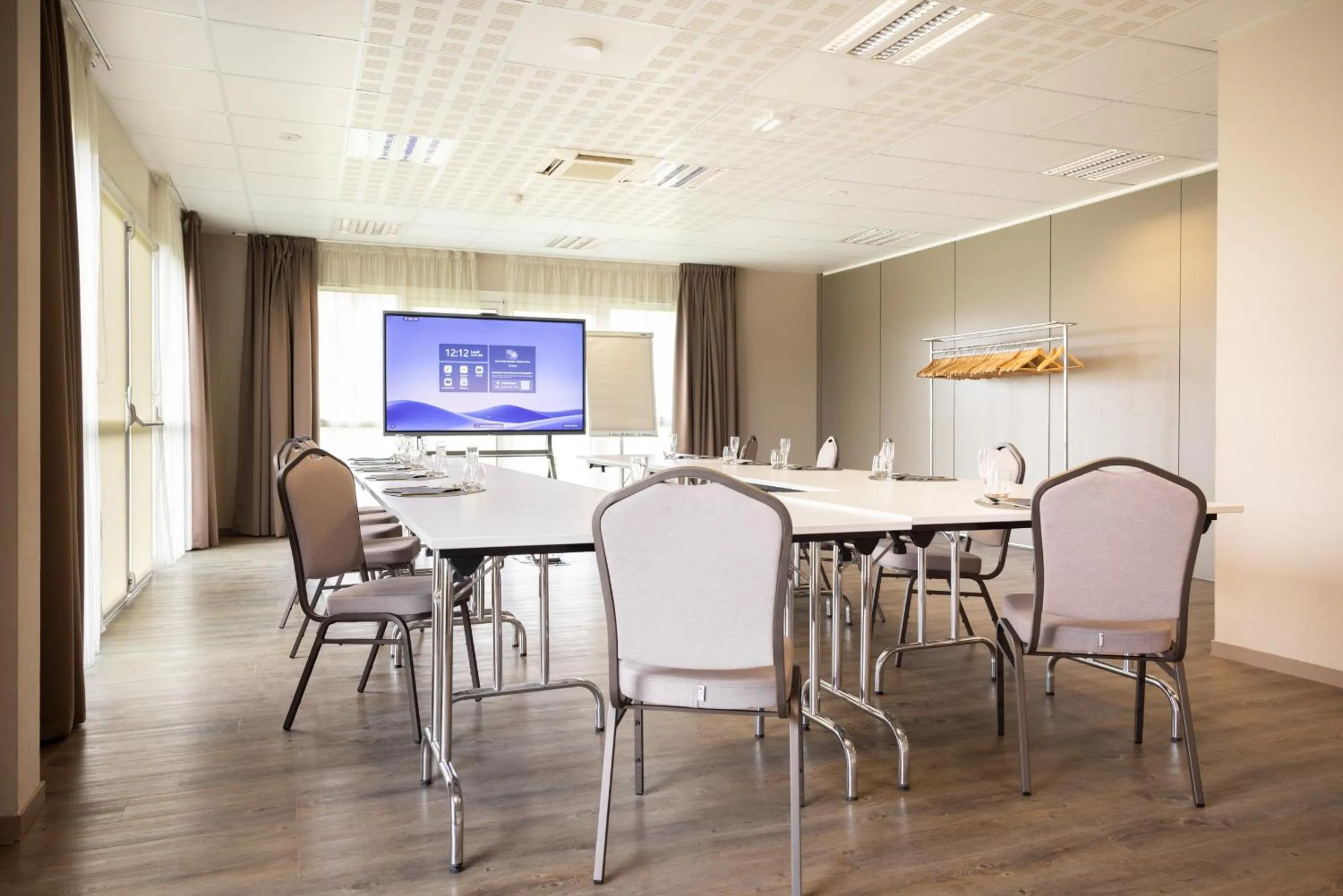 Seating area in Brit Hotel Saint-Méen-le-Grand en Brocéliande
