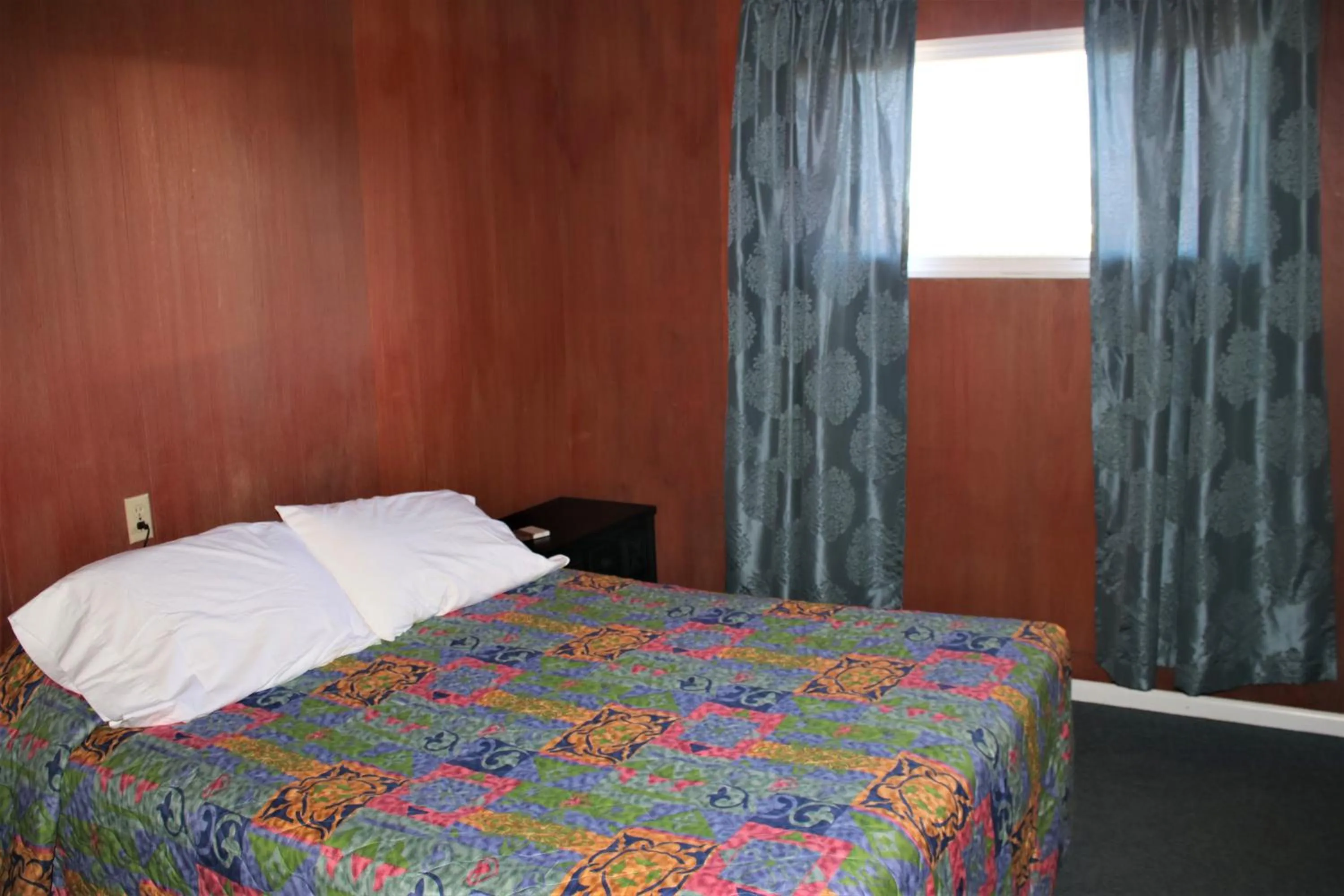 Bed in The Lowtide Motel