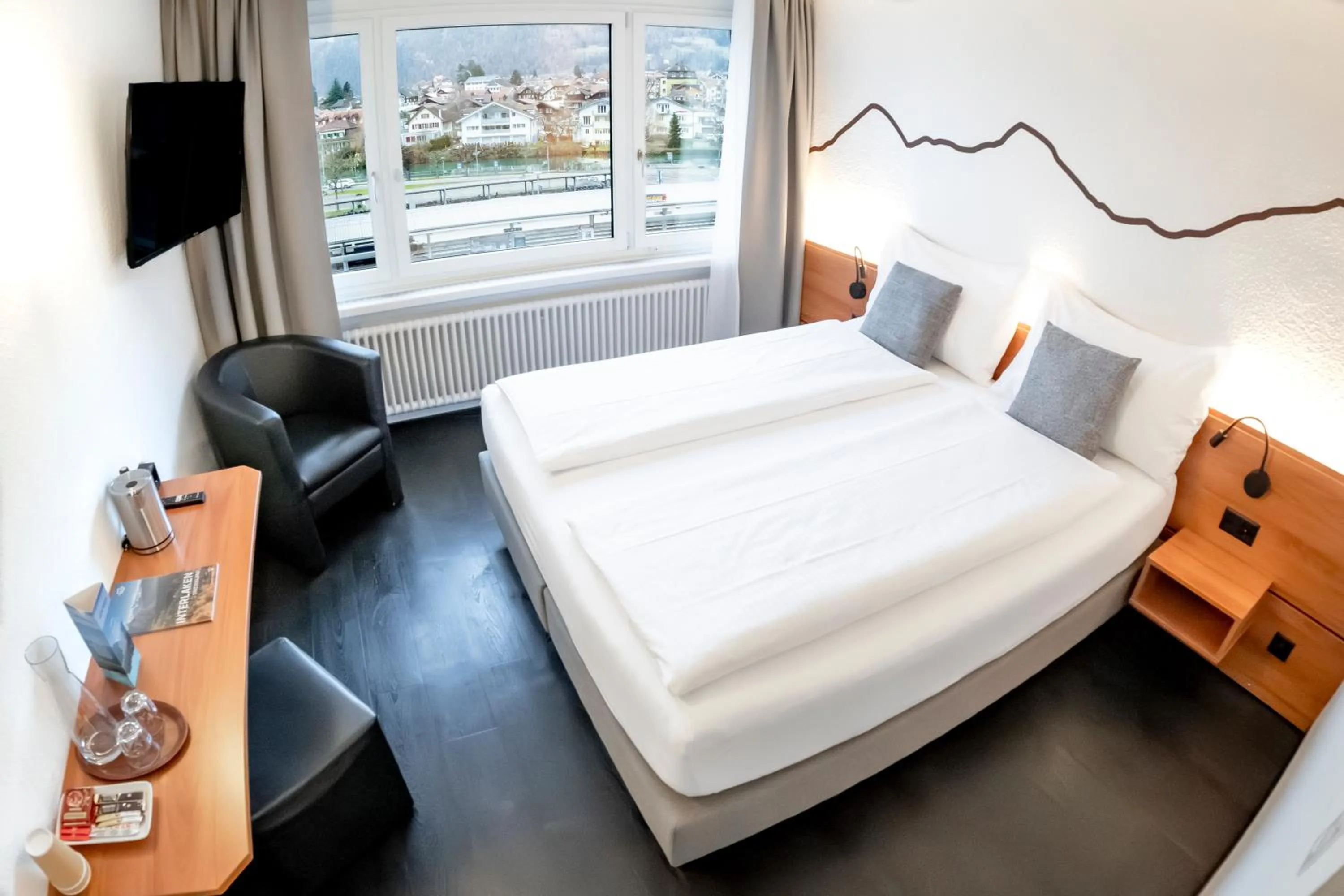 Bed in Hotel Merkur - West Station