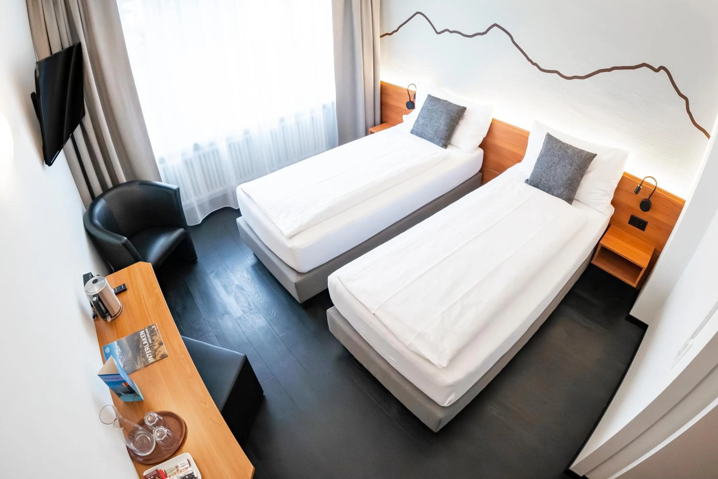 Bed in Hotel Merkur - West Station