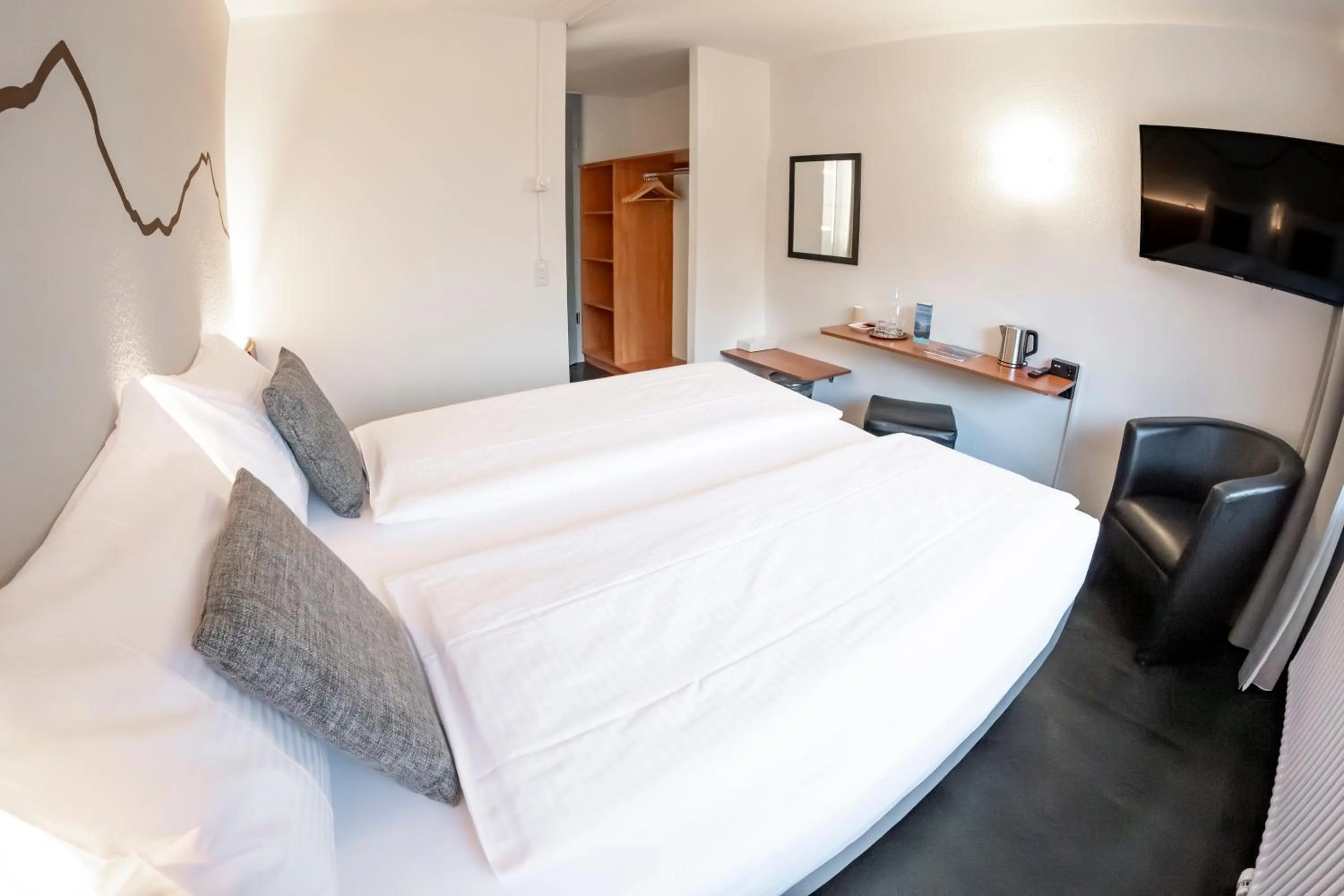 Bed in Hotel Merkur - West Station