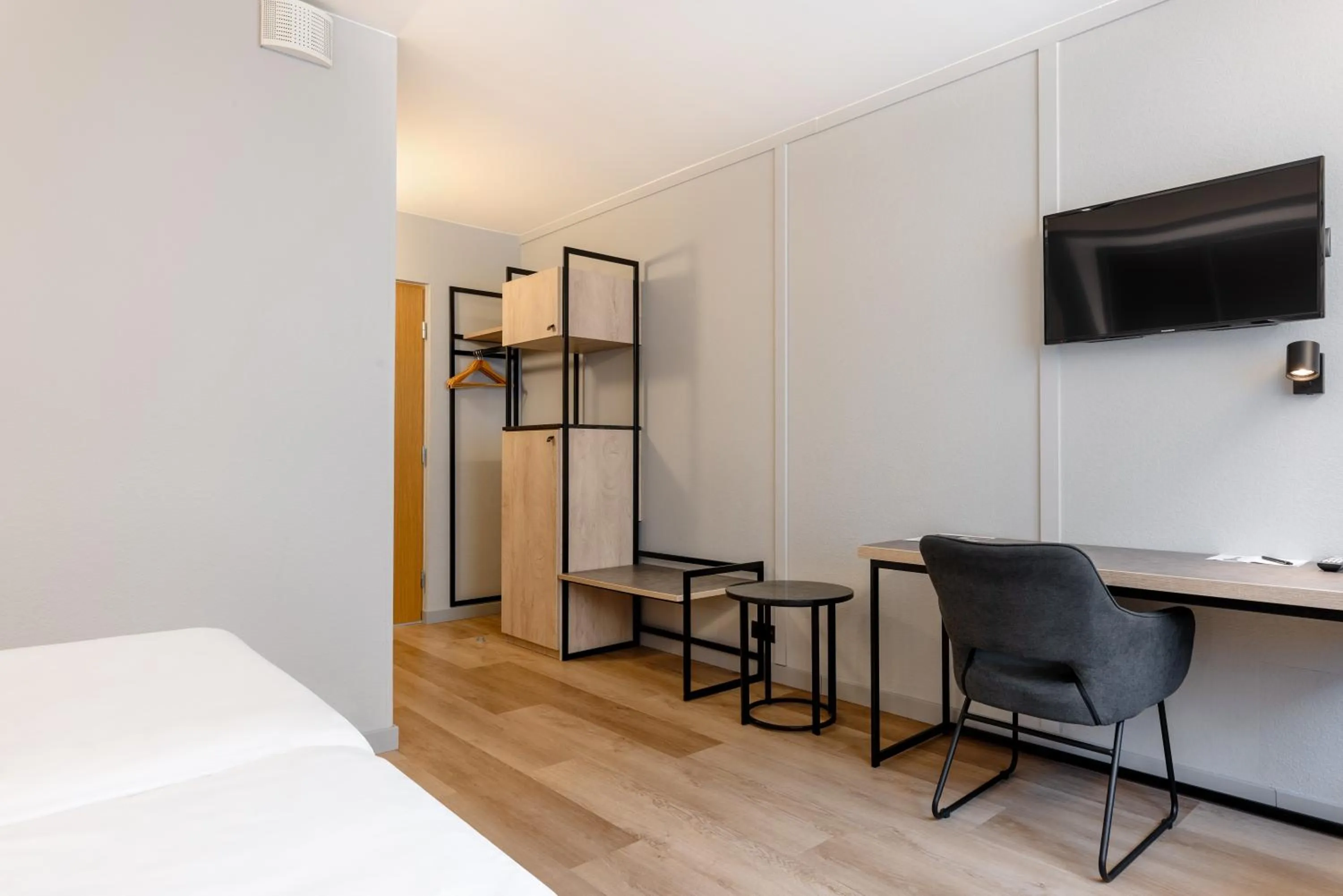 TV and multimedia, Bed in Metropol Hotel