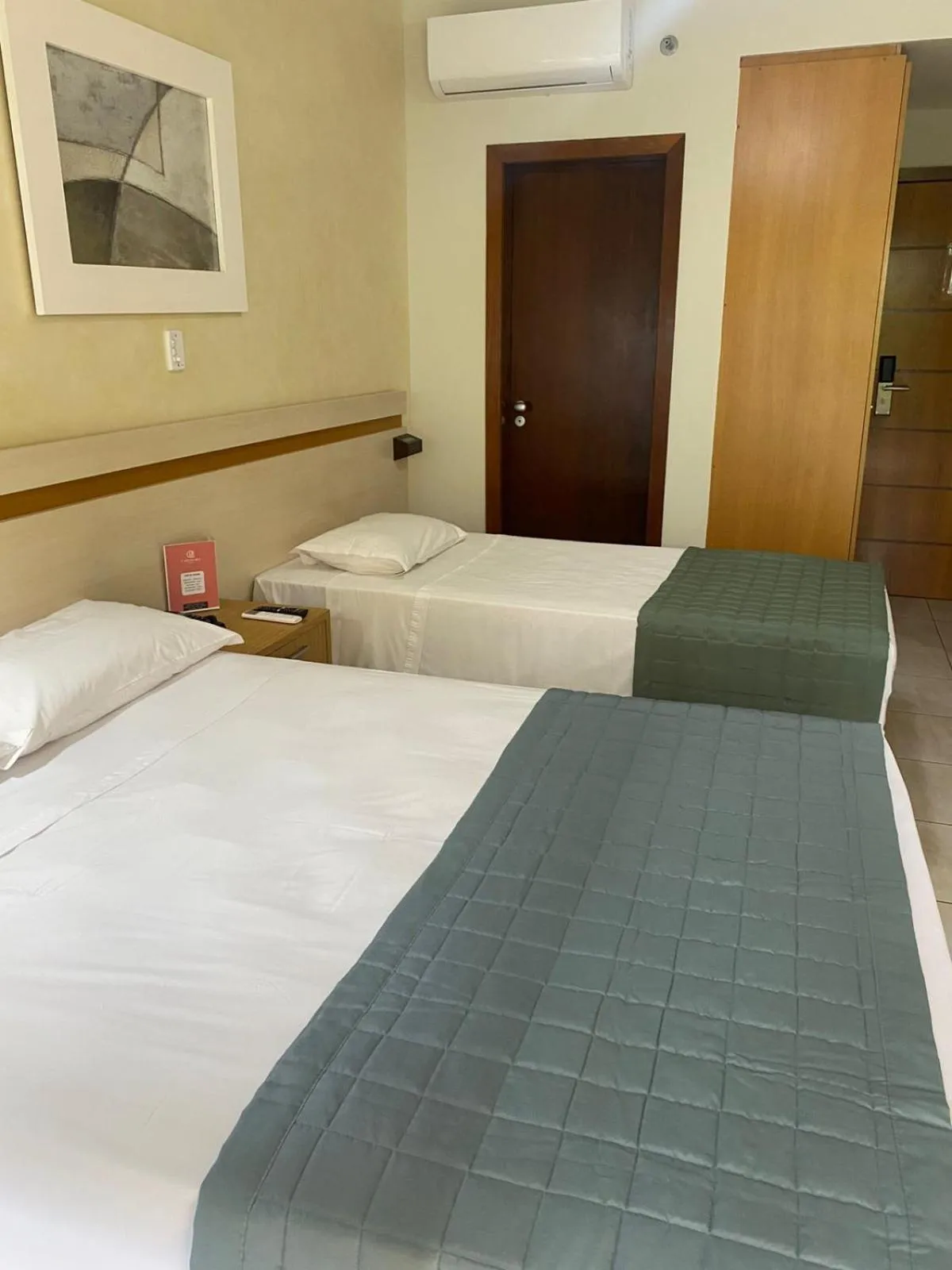 Bed in Catussaba Business Hotel