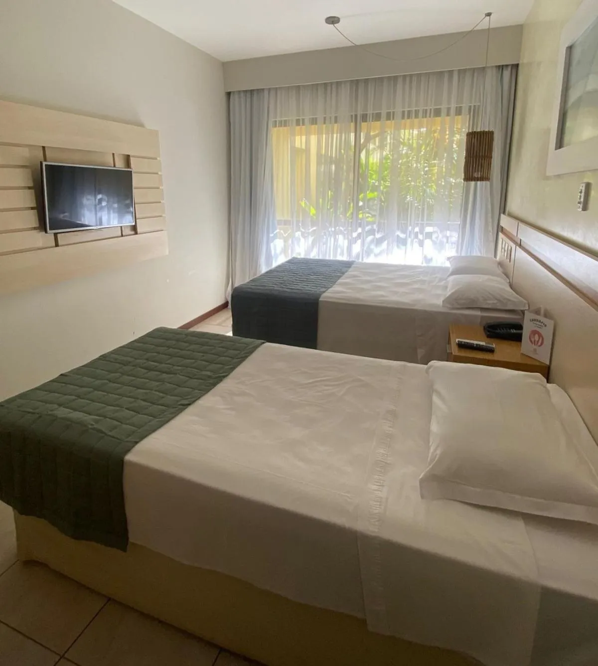 Bed in Catussaba Business Hotel