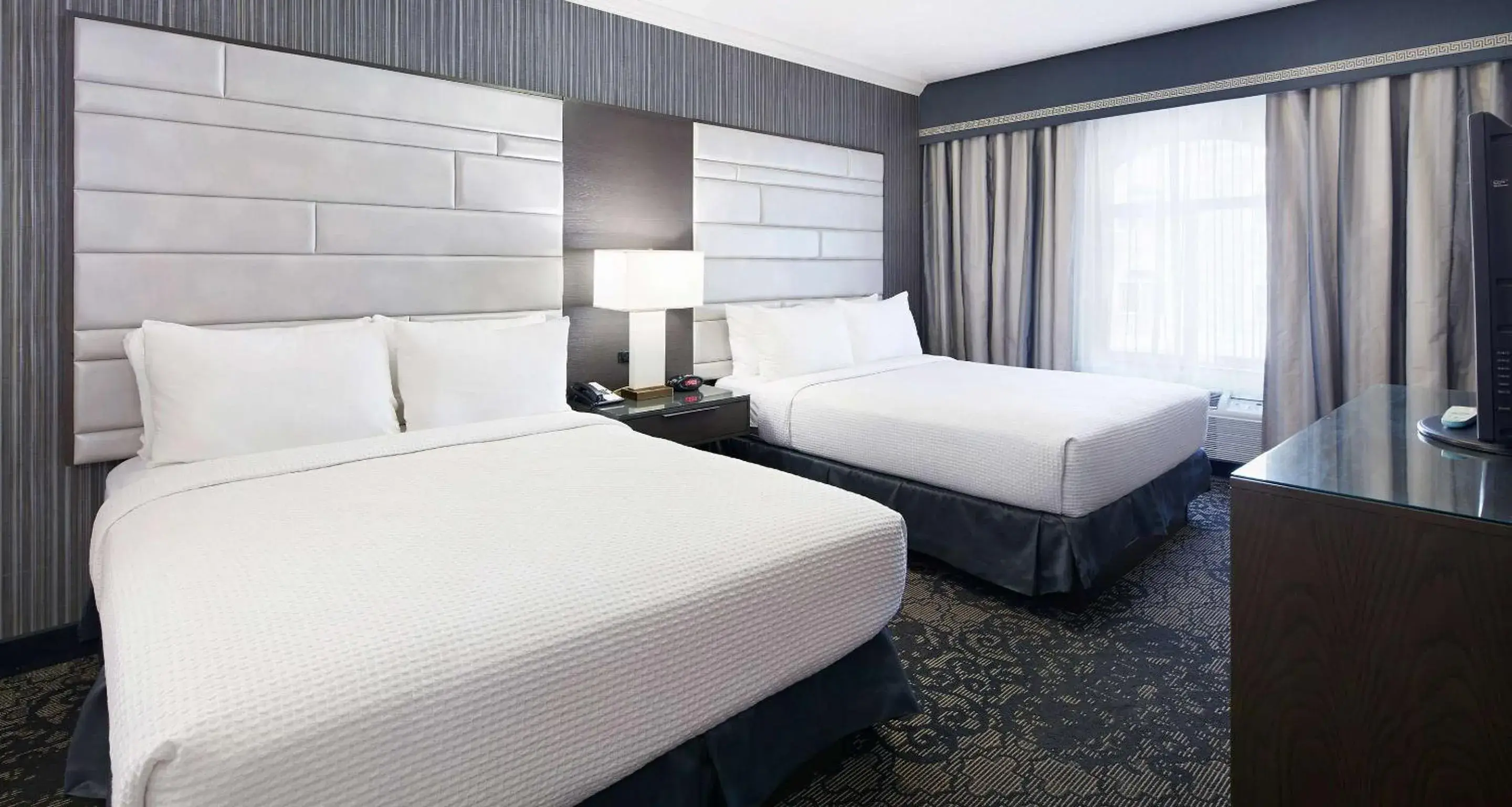 Two-Room Queen Suite with Two Queen Beds and Sofa Bed- Jetted Tub/South Tower in Best Western Plus Abbey Inn Two-Room Queen Suite with Two Queen Beds and Sofa Bed- Jetted Tub/South Tower in Best Western Plus Abbey Inn