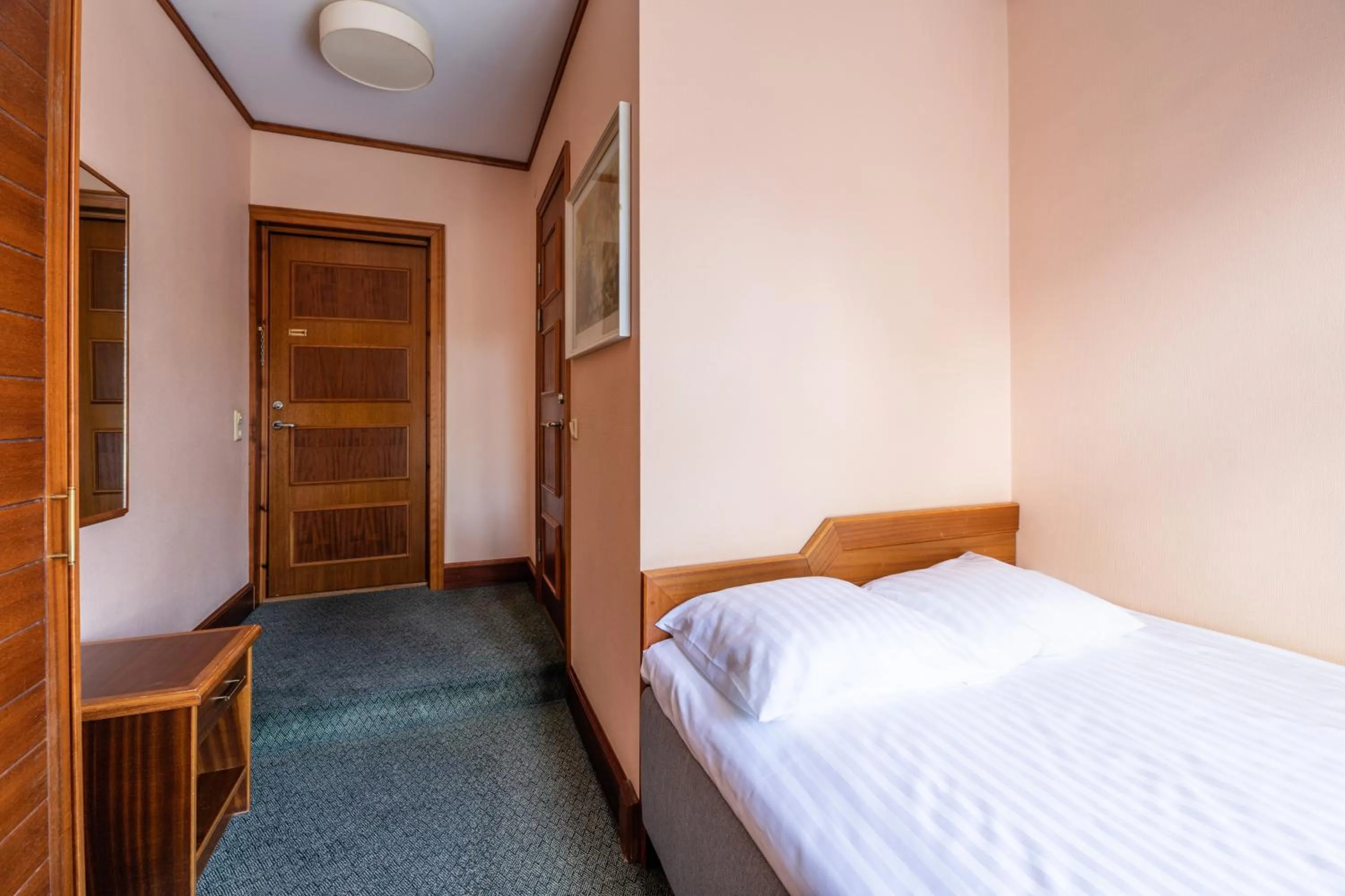 Bed in Hotel Victoria