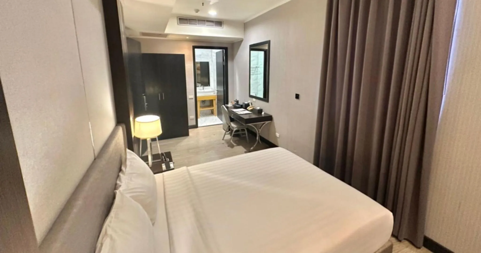 Photo of the whole room, Bed in Le Charmé Suites - Subic