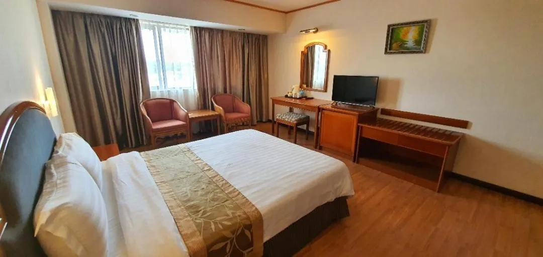 Bed in Kemena Plaza Hotel