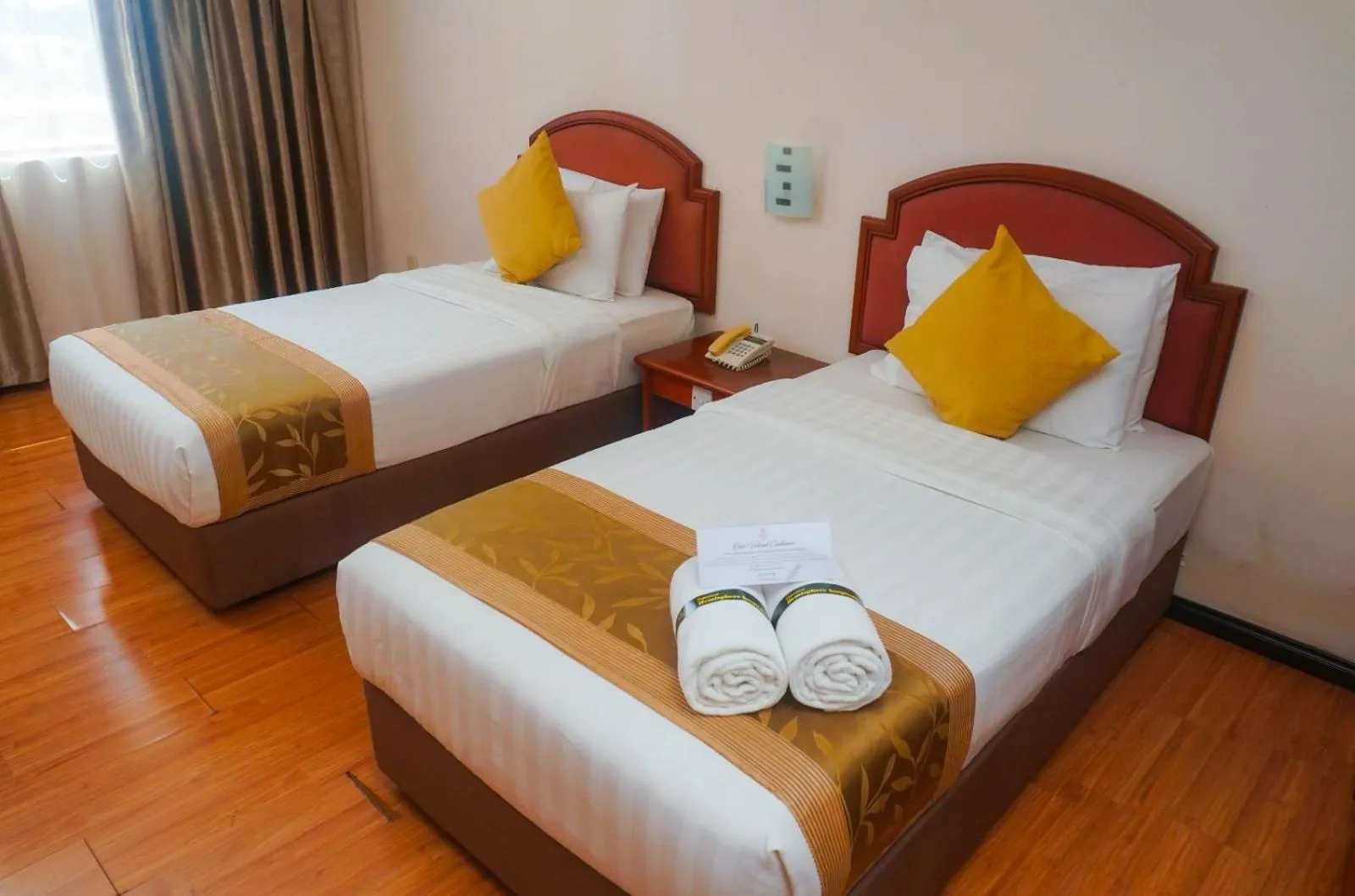 Bed in Kemena Plaza Hotel