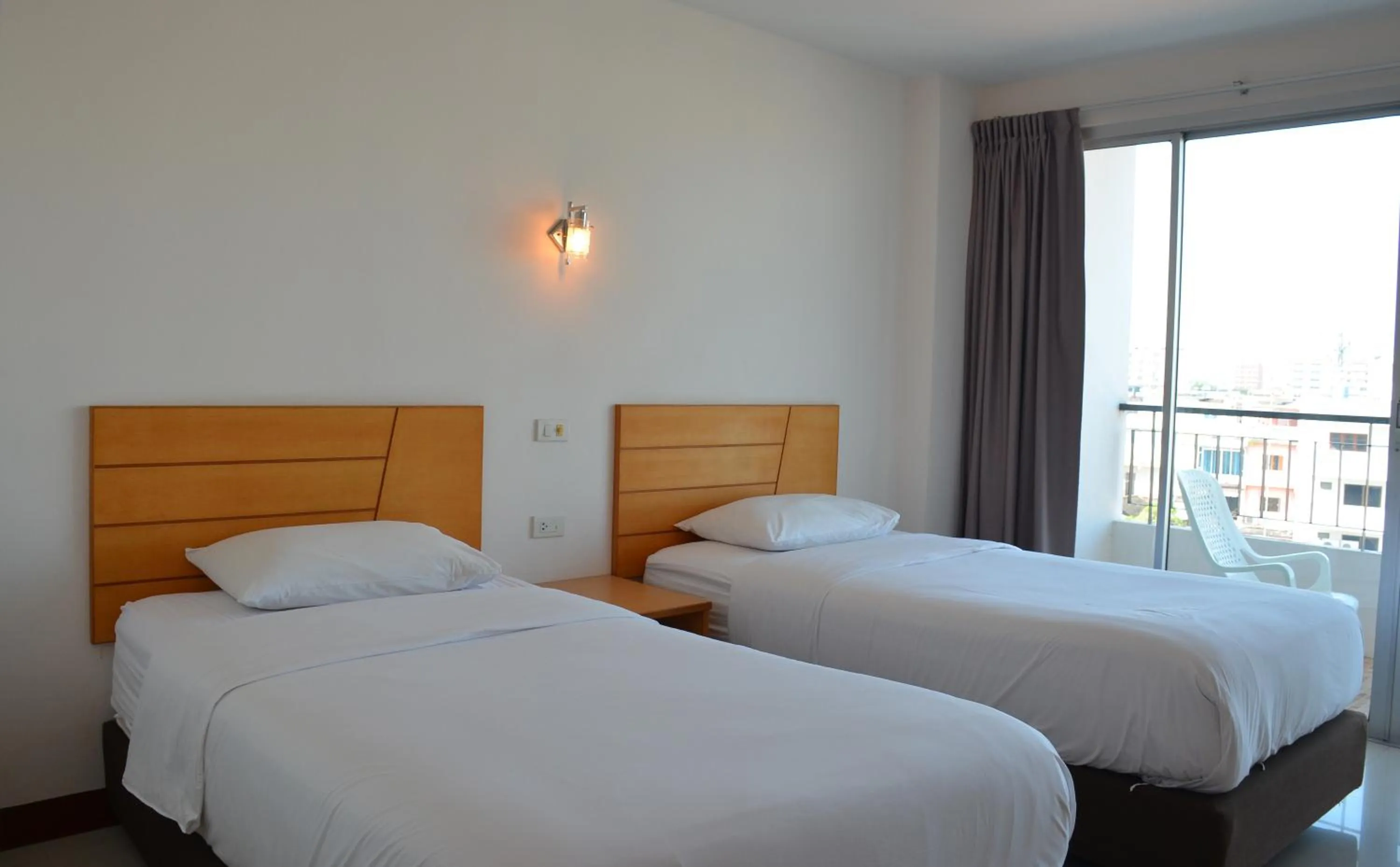 Bed in Baan Manthana Hotel, Hua Hin